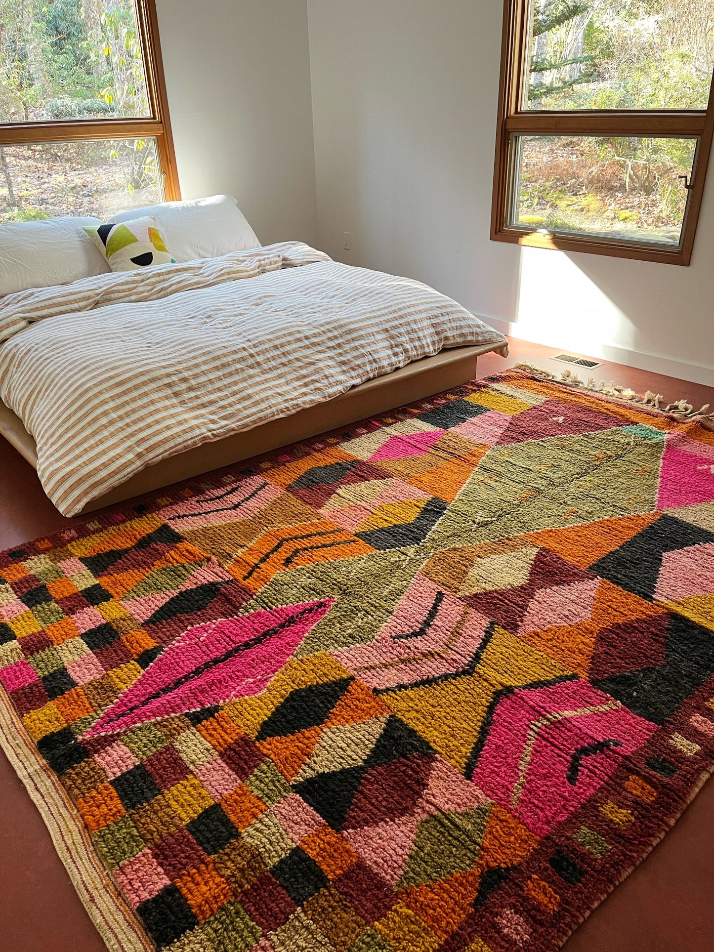 See Sala Moroccan Rug from an Angle in a Primary Bedroom