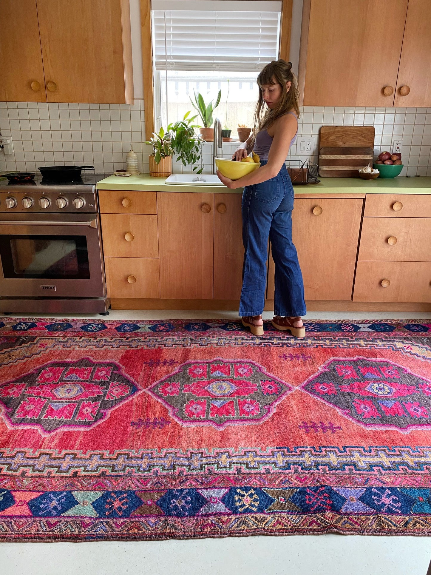 See Vintage Fava Persian Rug's Pop of Colors in the Kitchen