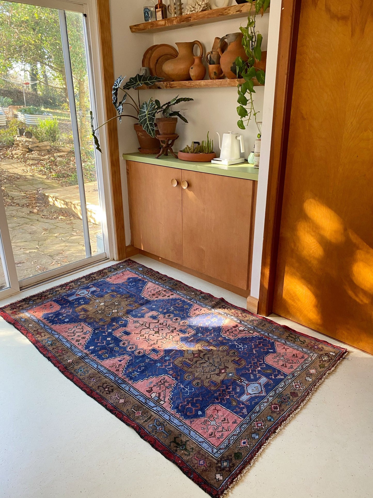 Style an Entryway with a Blue and Pink Persian Area Rug