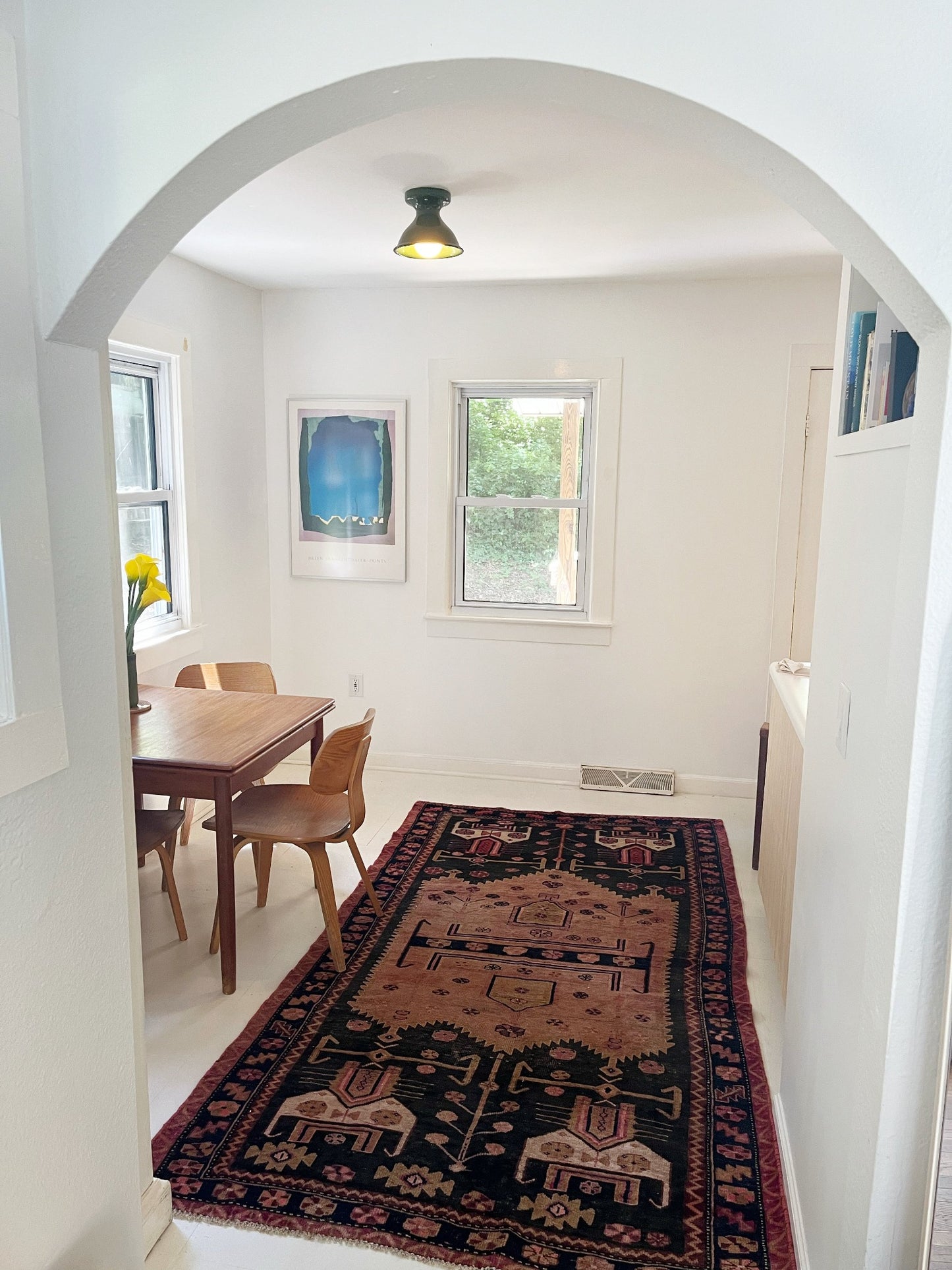 See Vintage Charcoal Runner Rug in a Dining Room