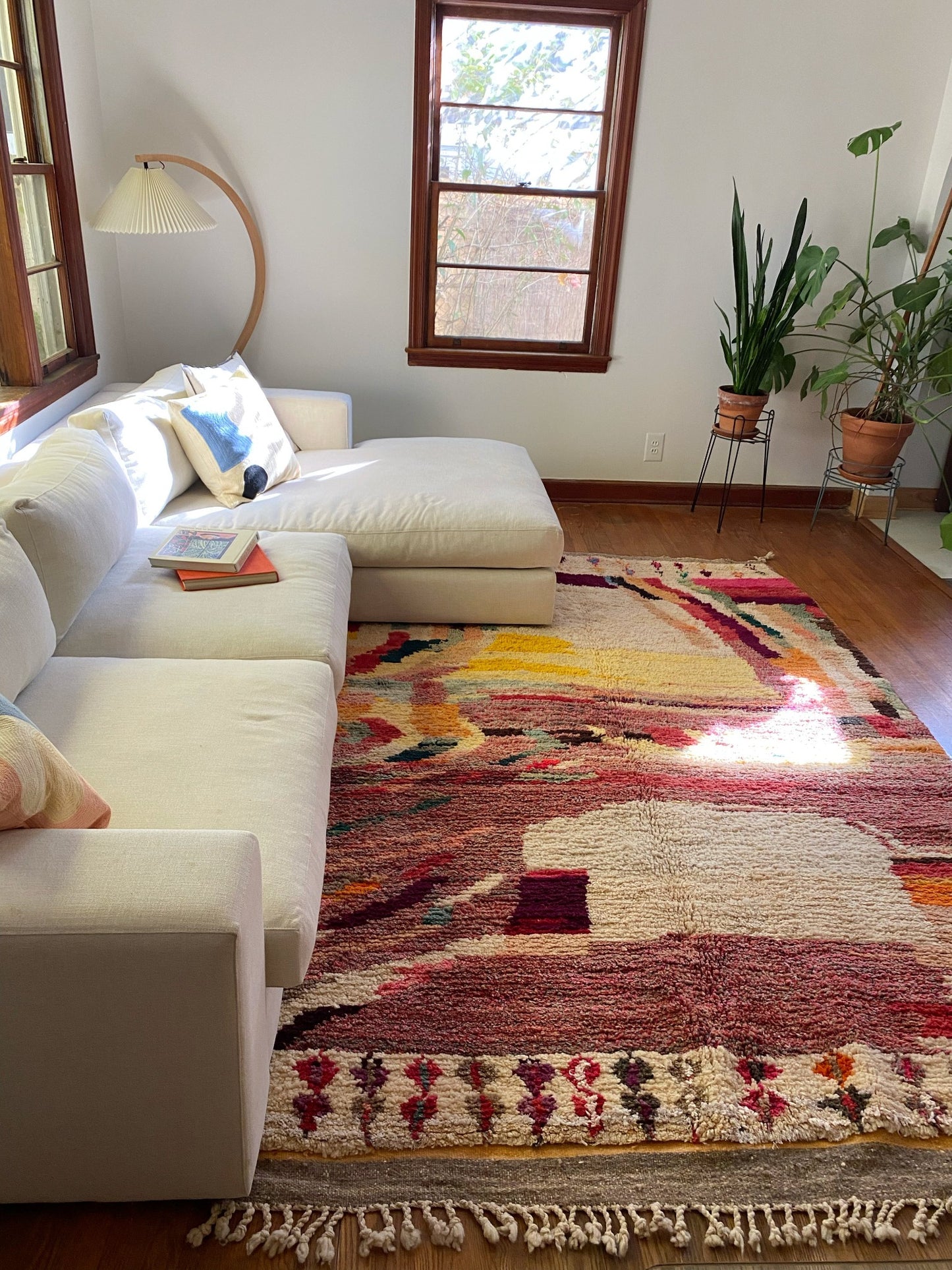 Style Almond Moroccan Rug with a Sectional Couch