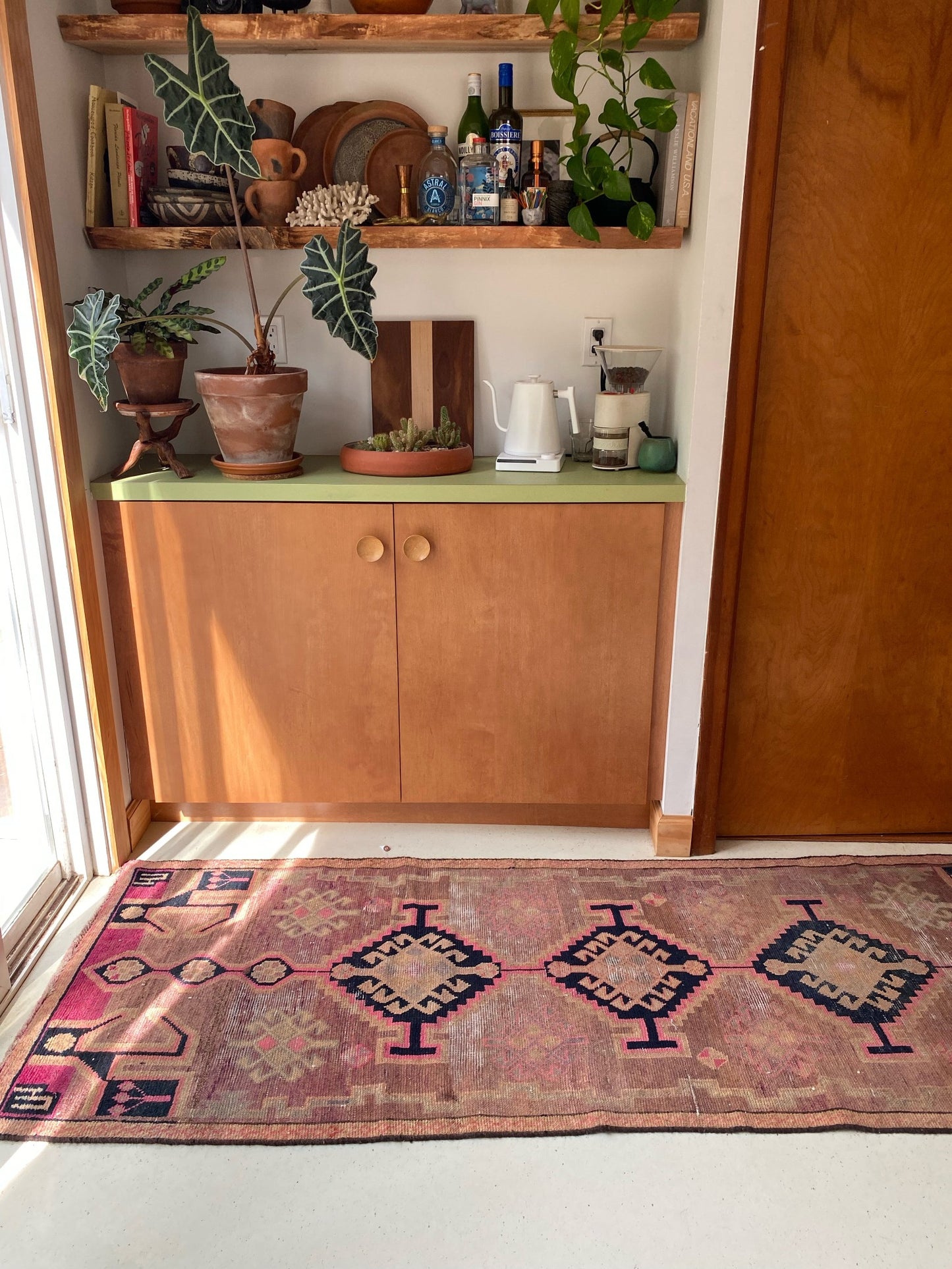Style Indus Vintage Persian Runner Rug at a Coffee Bar
