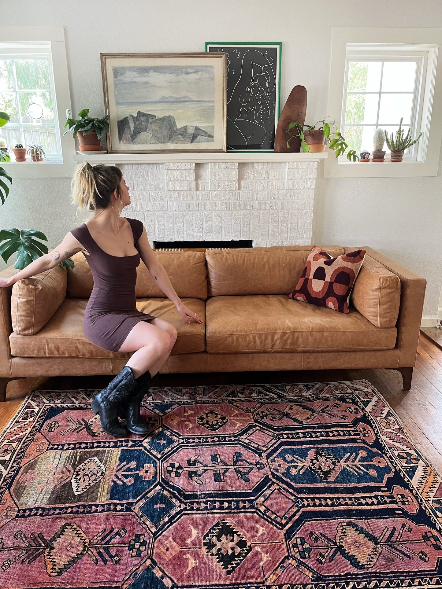 See Indigo and Terracotta Tones in Cala Vintage Persian Rug