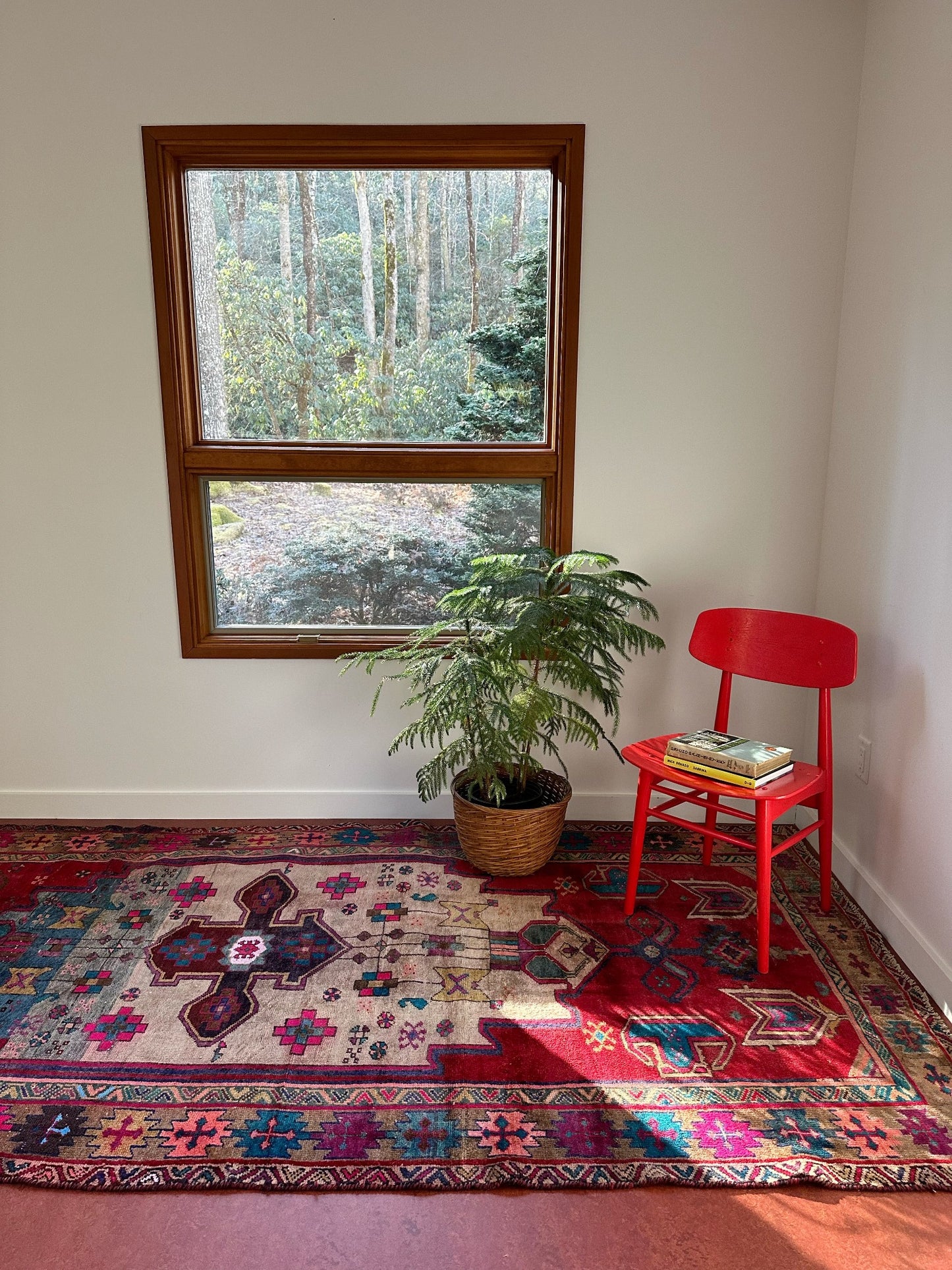 See Cape Styled with a Bright Red Chair