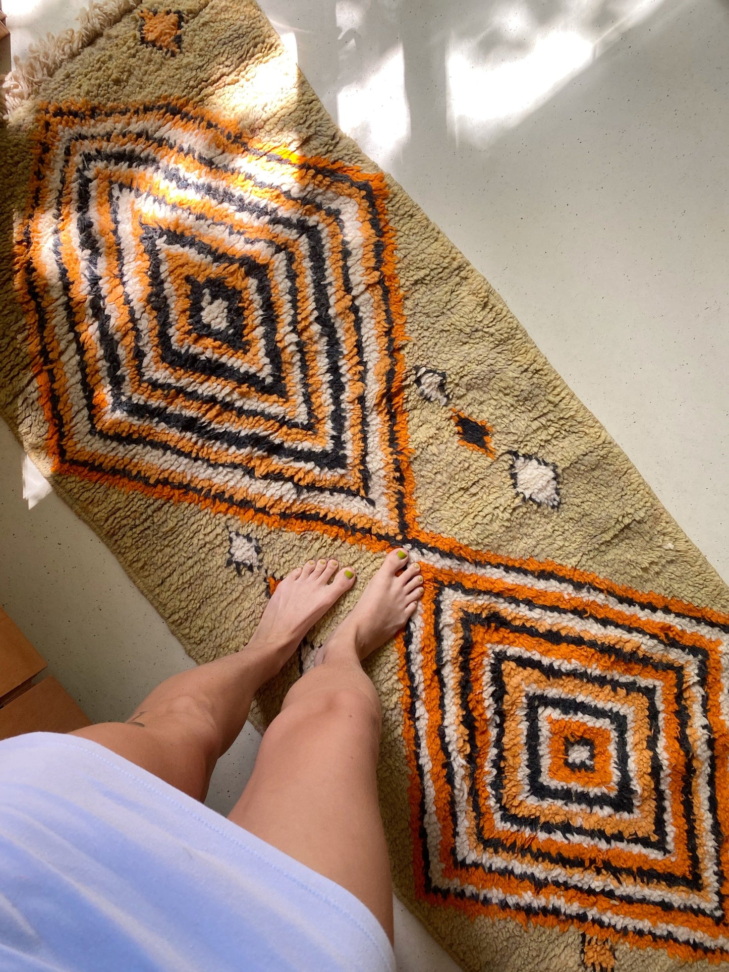 handwoven wool moroccan runner. the colors are gorgeous earth tones.