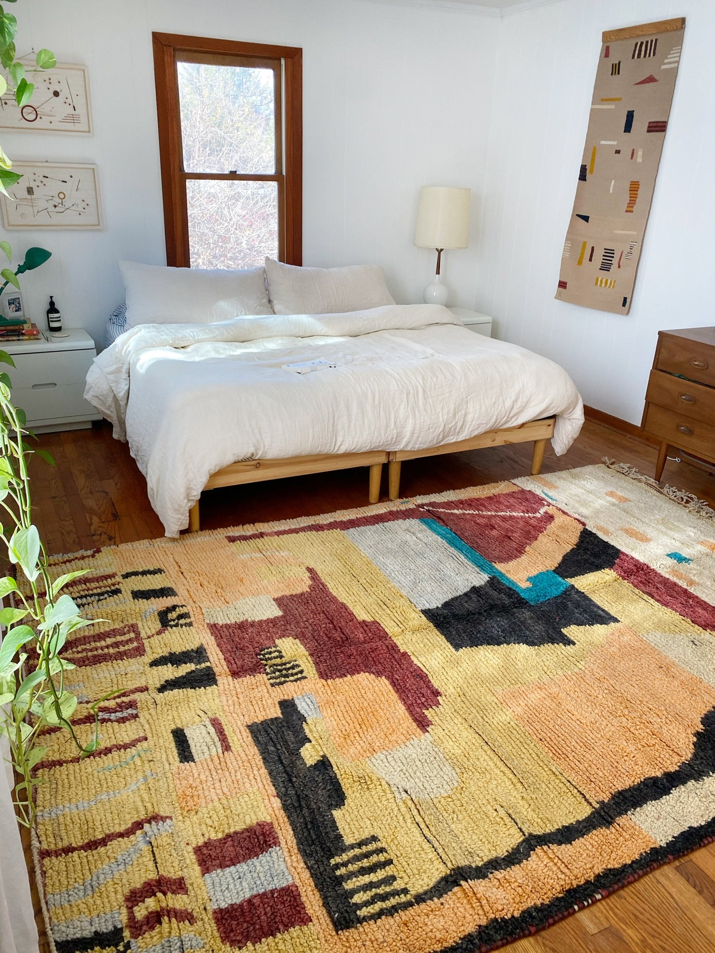 See Bennett Moroccan Rug with a King Size Bed