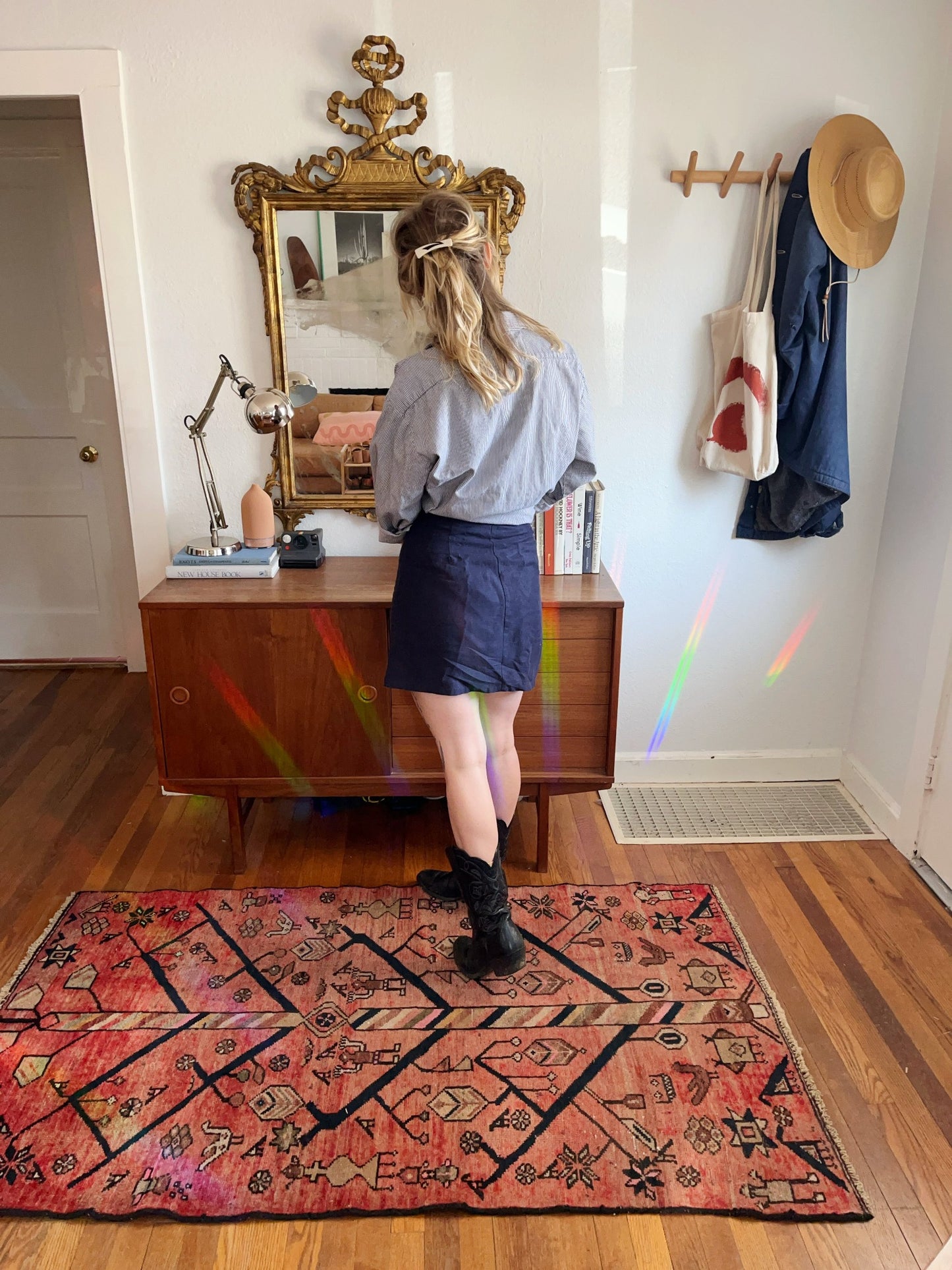 See Adian pink Persian Rug in an Entryway