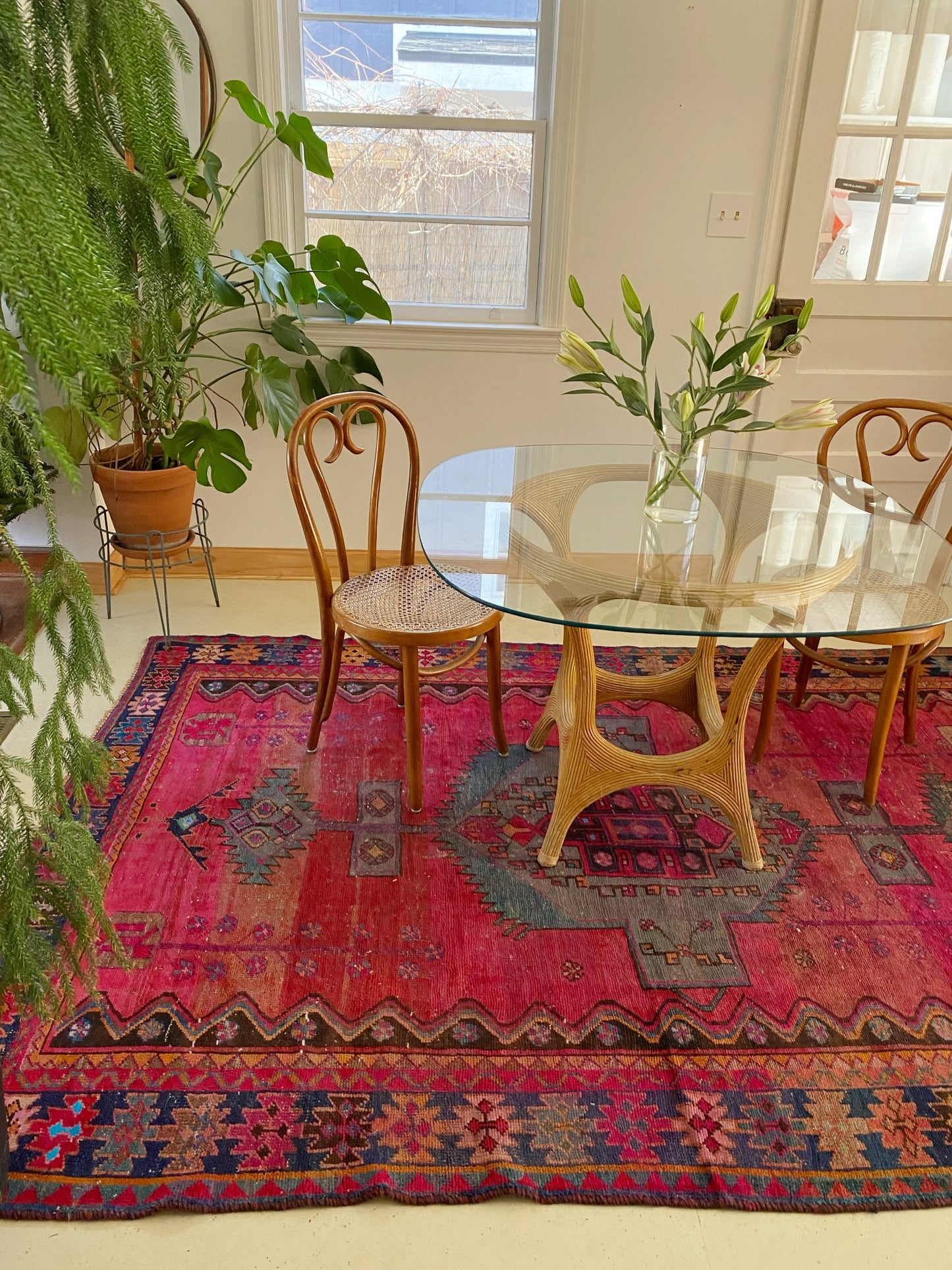See colorful Persian rug at the Dining Room Table