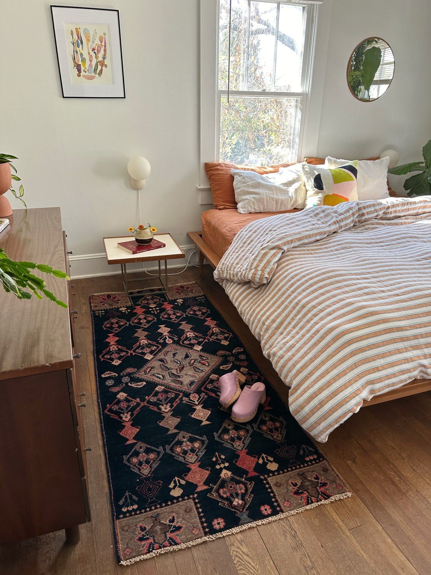 Style Amphora Persian Rug with a King Size Bed