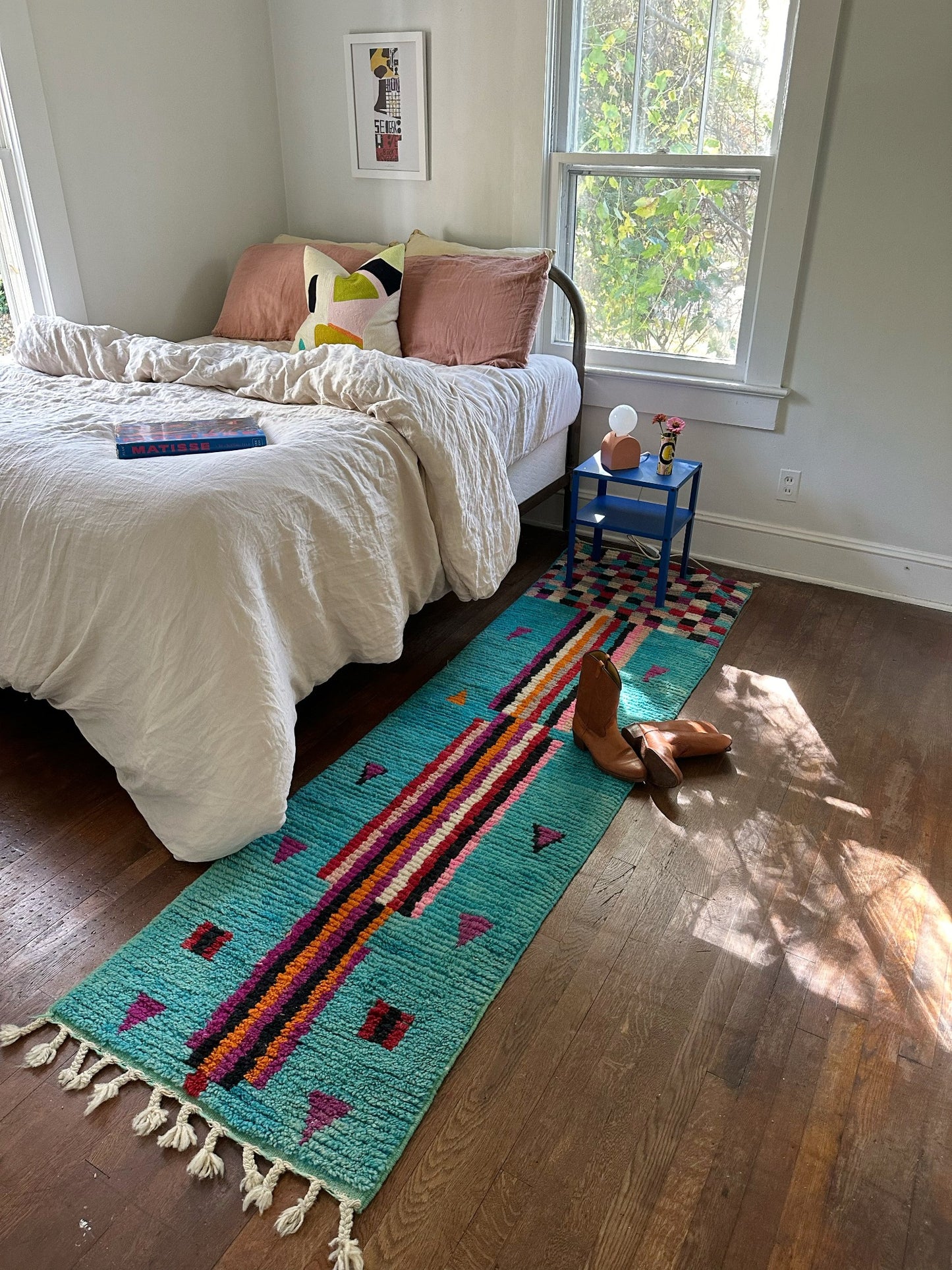 Julep Moroccan runner is lovely styled in a room with sunlight streaming through the window.