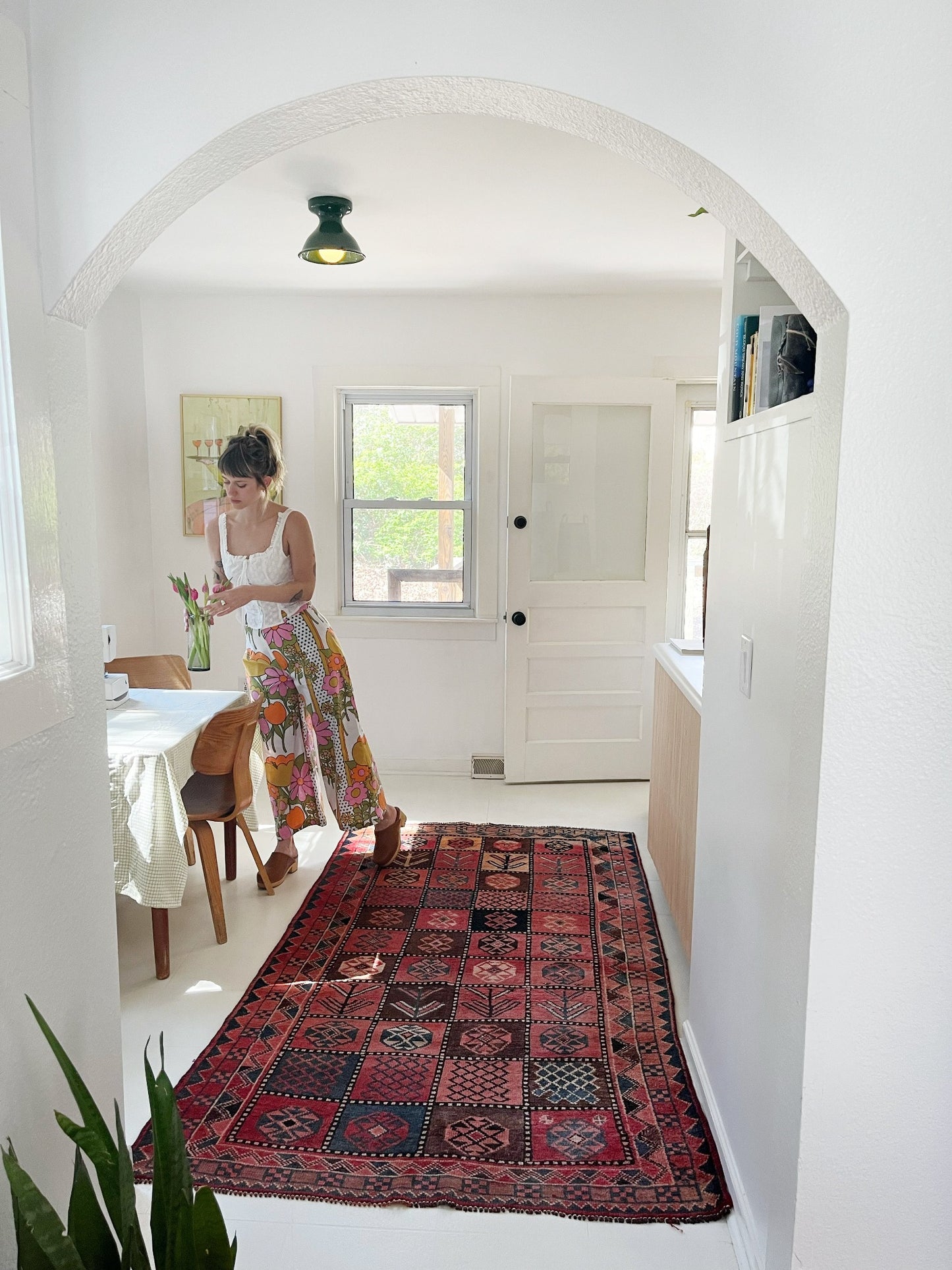 See Diavola Vintage Persian Rug in a Dining Room