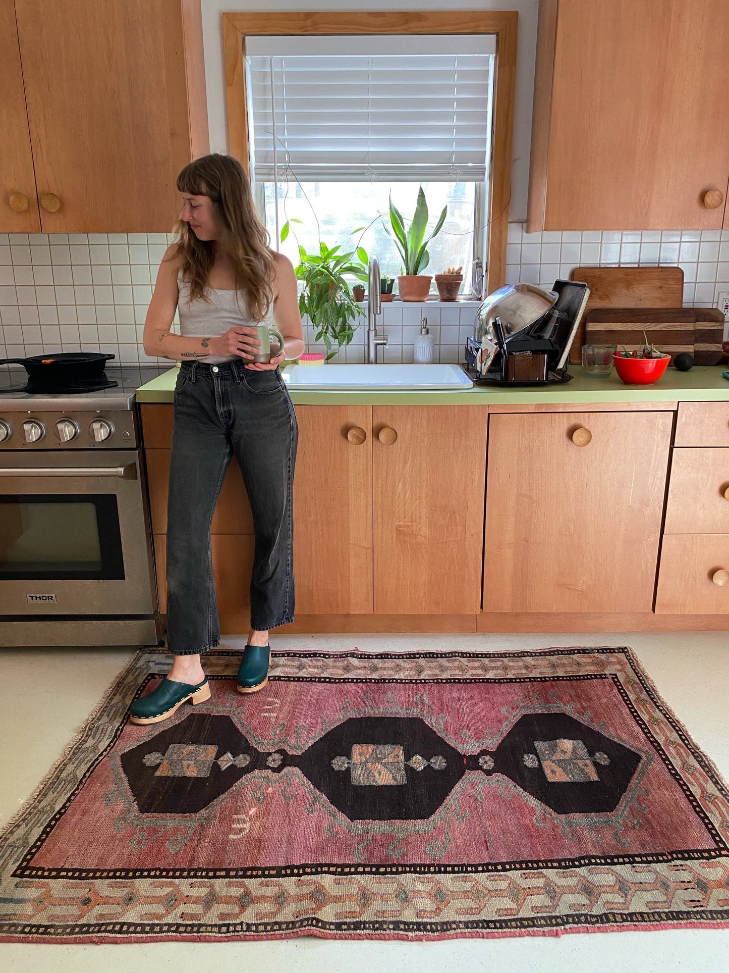 Style Vintage Muted Tones Persian Rug in a Kitchen