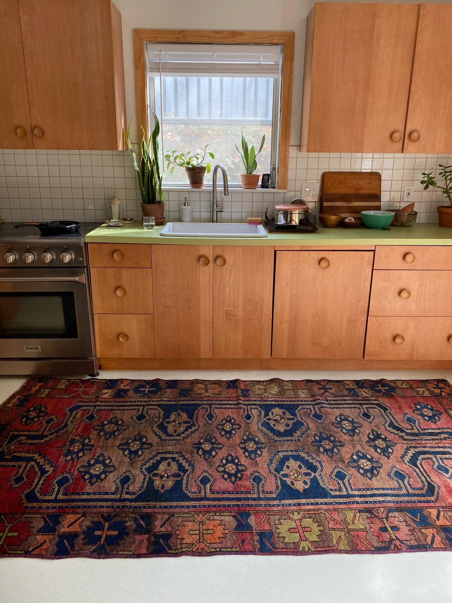 Style Henna Persian Rug in a Kitchen