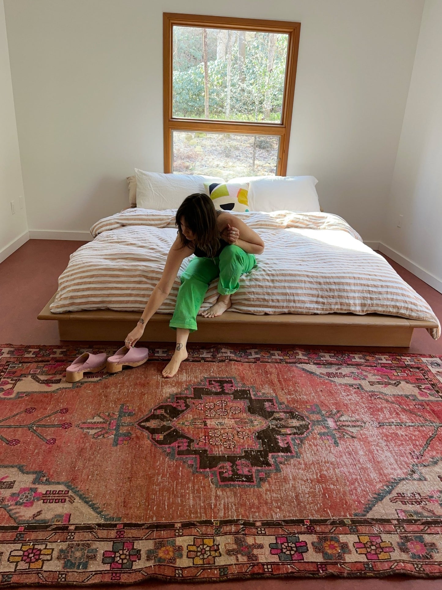 See Solanum Persian Rug Styled with a Platform King Size Bed