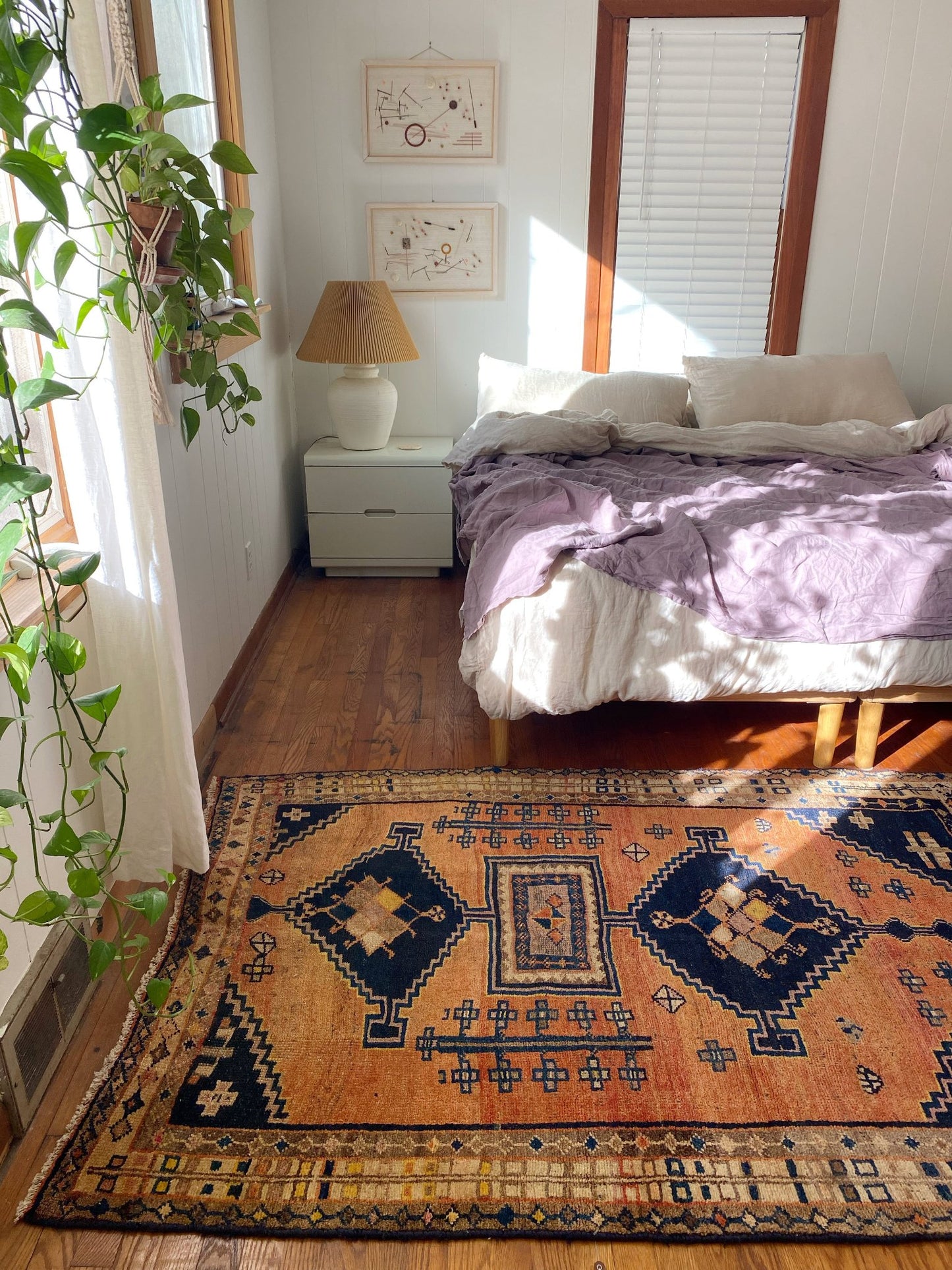 Enhance a Bedroom with a Warm Toned Vintage Persian Rug