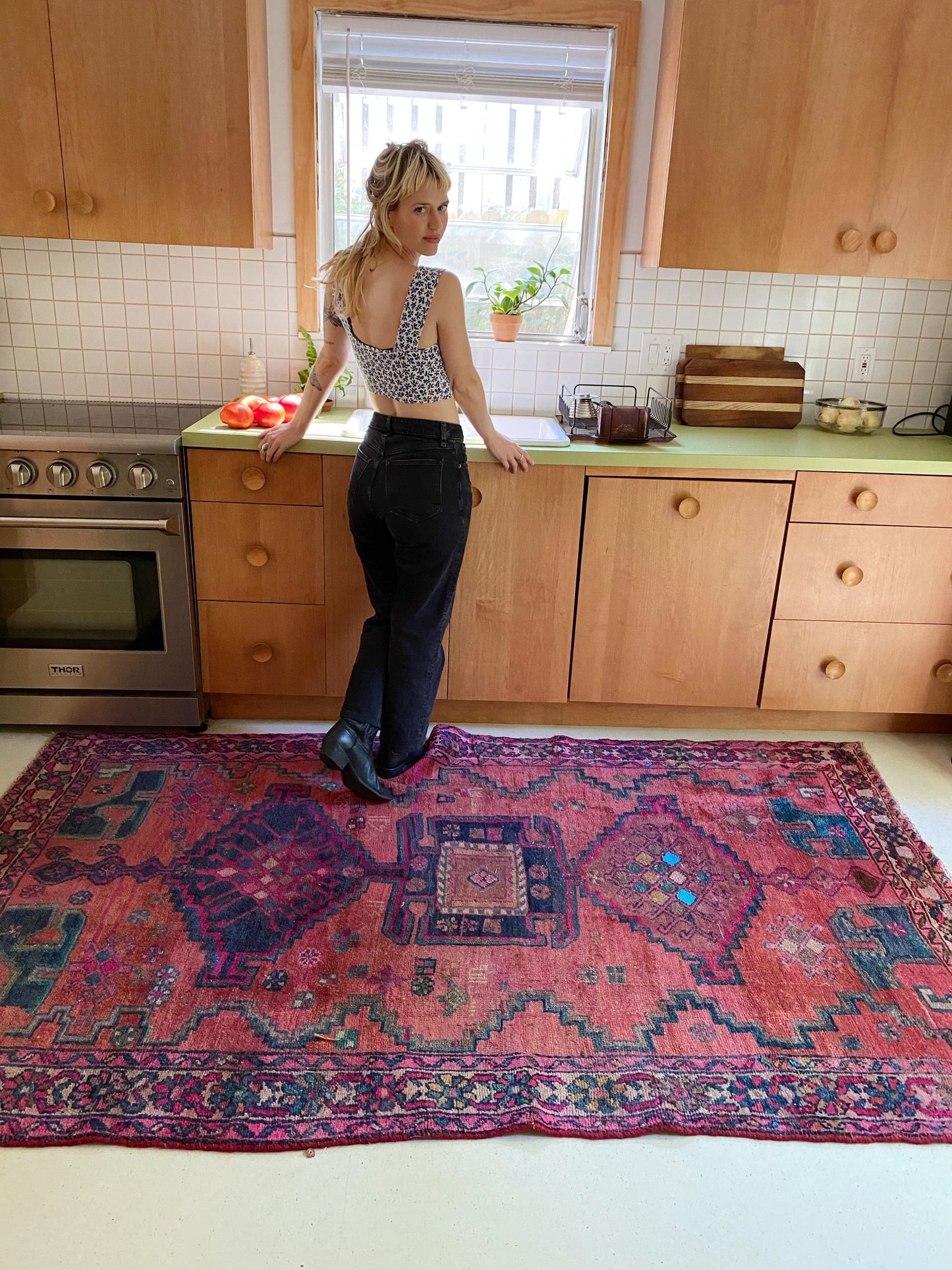 Vintage Persian Area Rug: Terracotta-Woven Beauty, Enriched by Central Motifs in Indigo, Fuscia, Cacao, and Azul Highlights. Preserved in Good Vintage State.