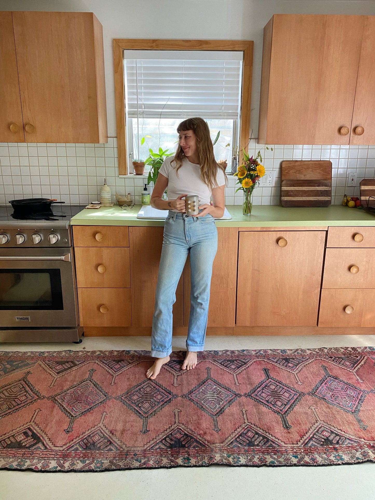 See Pink and Purple Vintage Runner Rug in a Kitchen