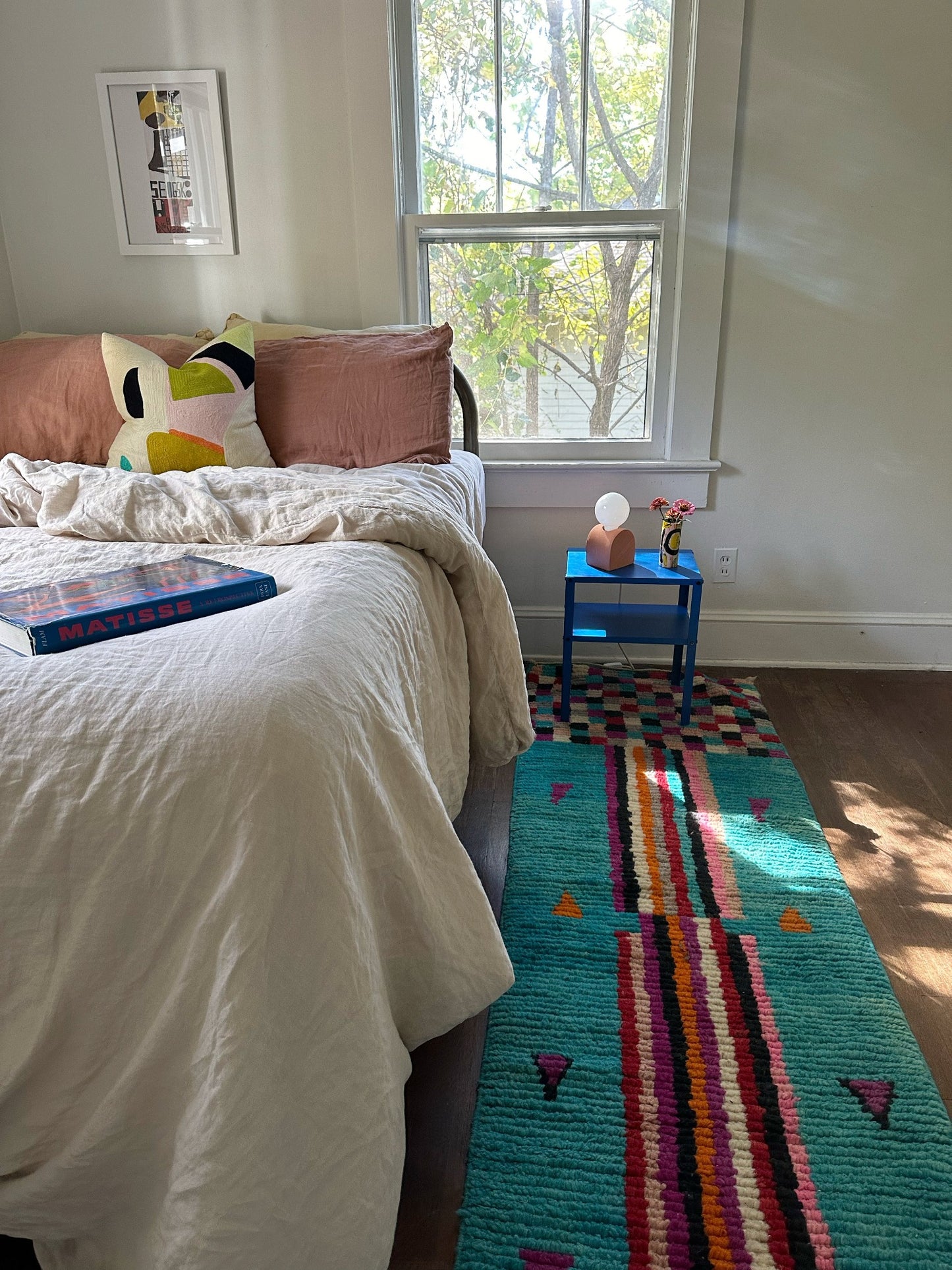 Julep Moroccan runner is such a fun shade of blue shown in a bedroom.