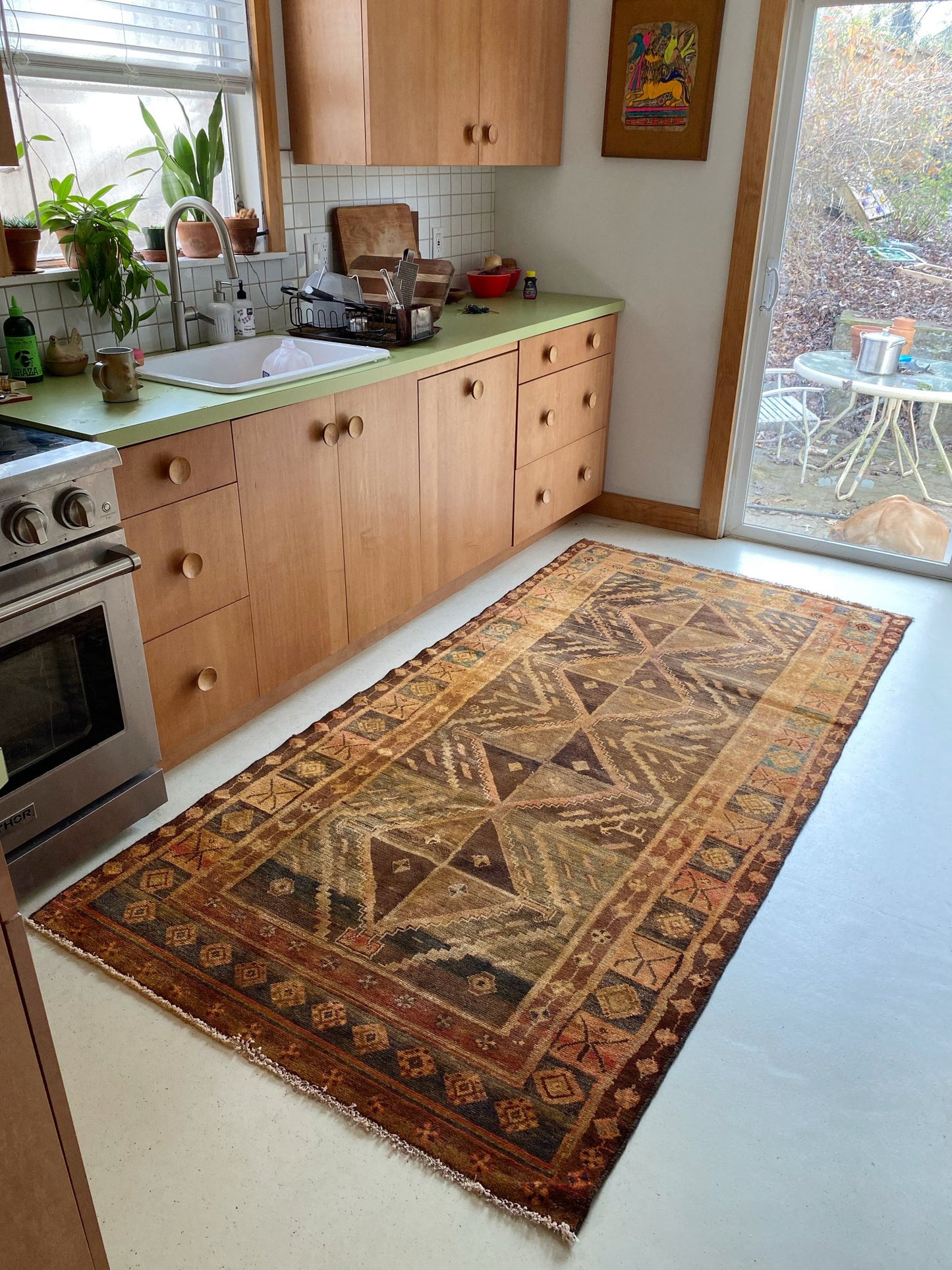 Enhance a Kitchen Space with a Vintage Persian Earthy Rug