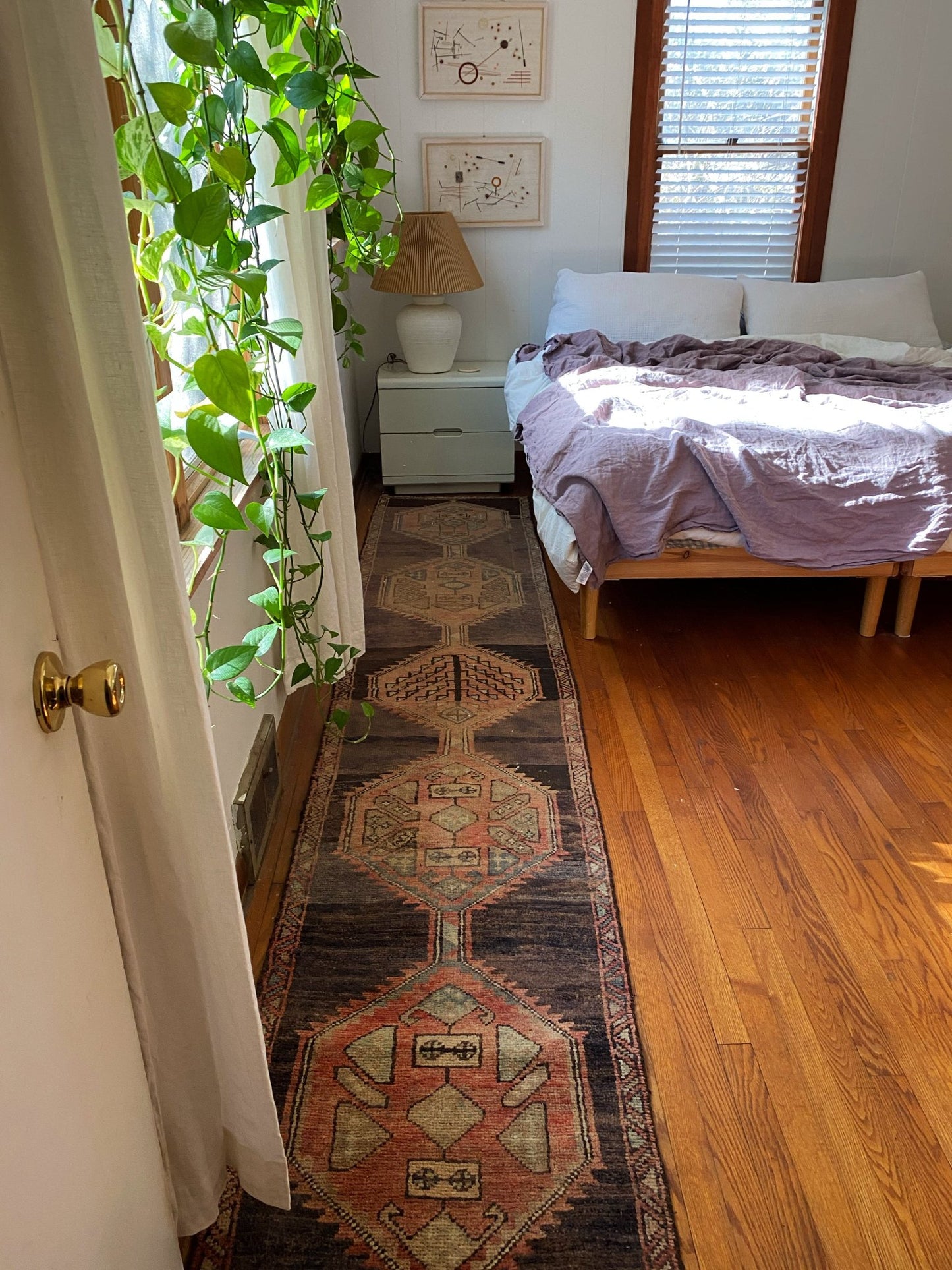 Enhance a Bedside with a Vintage Abrash Persian Runner Rug