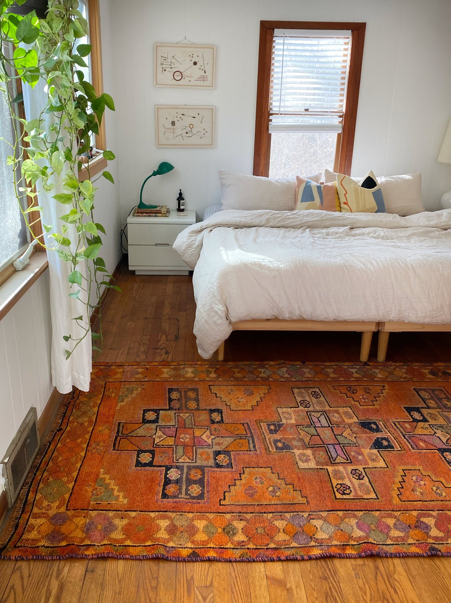 See Canary vintage Persian Rug with a King Size Bed