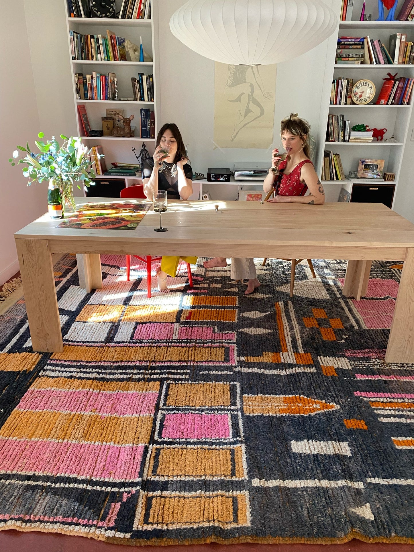 Colorful rugs the Caracol Moroccan Rug in a Dining Room