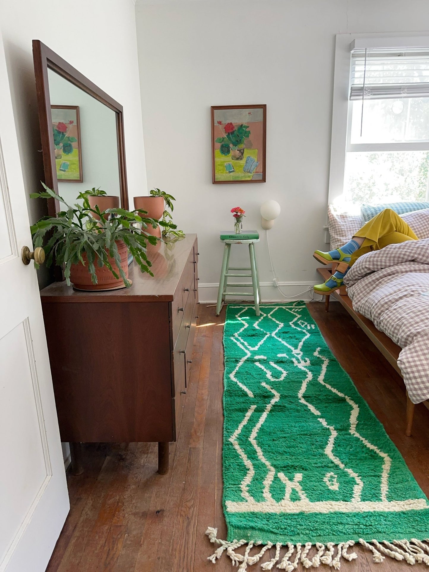 See Runner Rug Alongside a King Bed