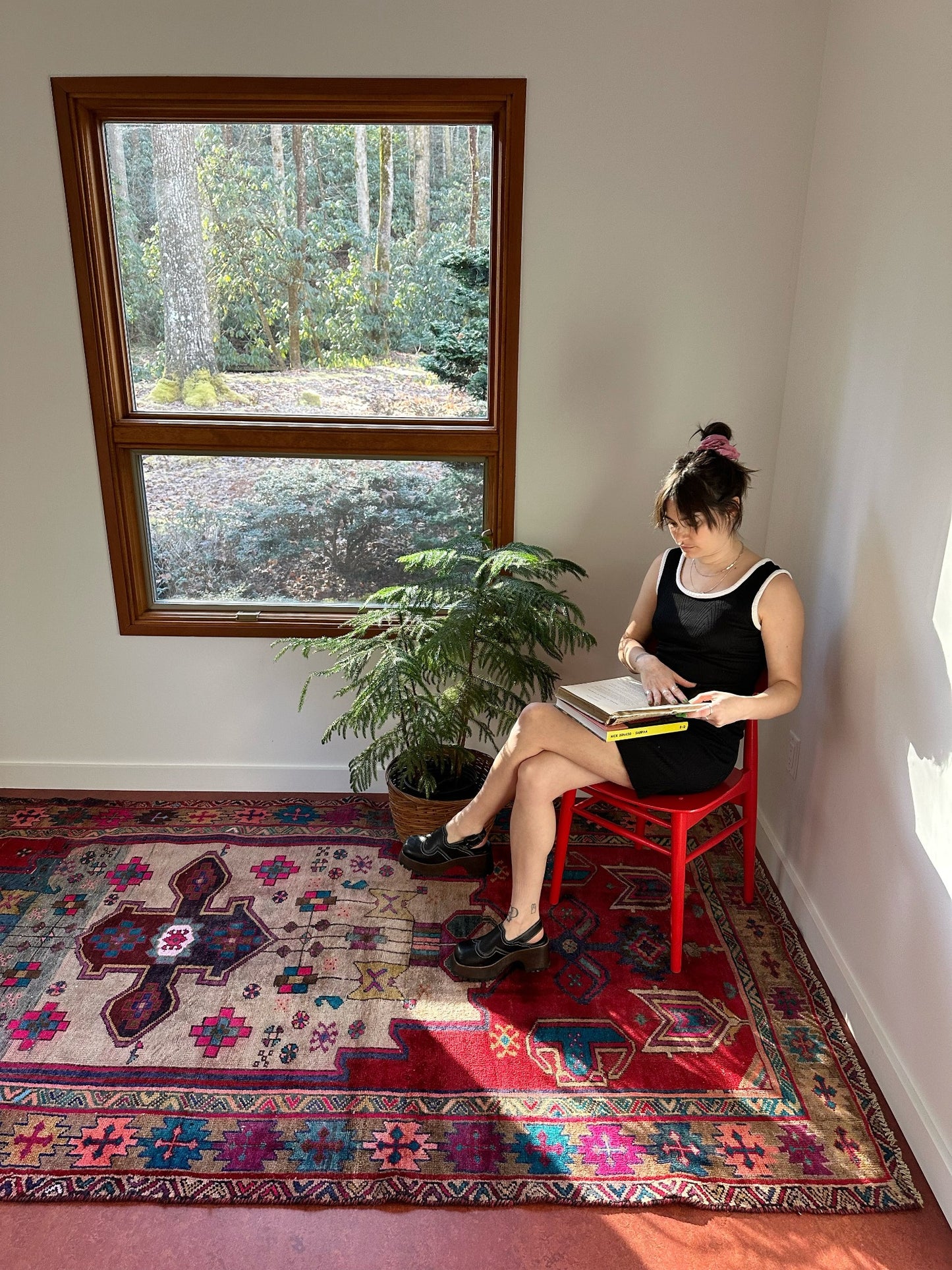 Style Cape Persian Rug in a Reading Corner
