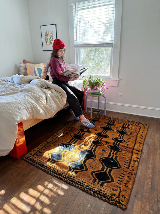 Style a Bedroom Space with a Golden Toned Vintage Persian Rug