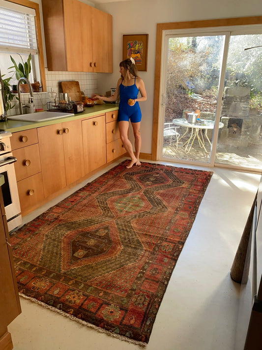 Enhance a Kitchen Space with a Muted Vintage Persian Area Rug