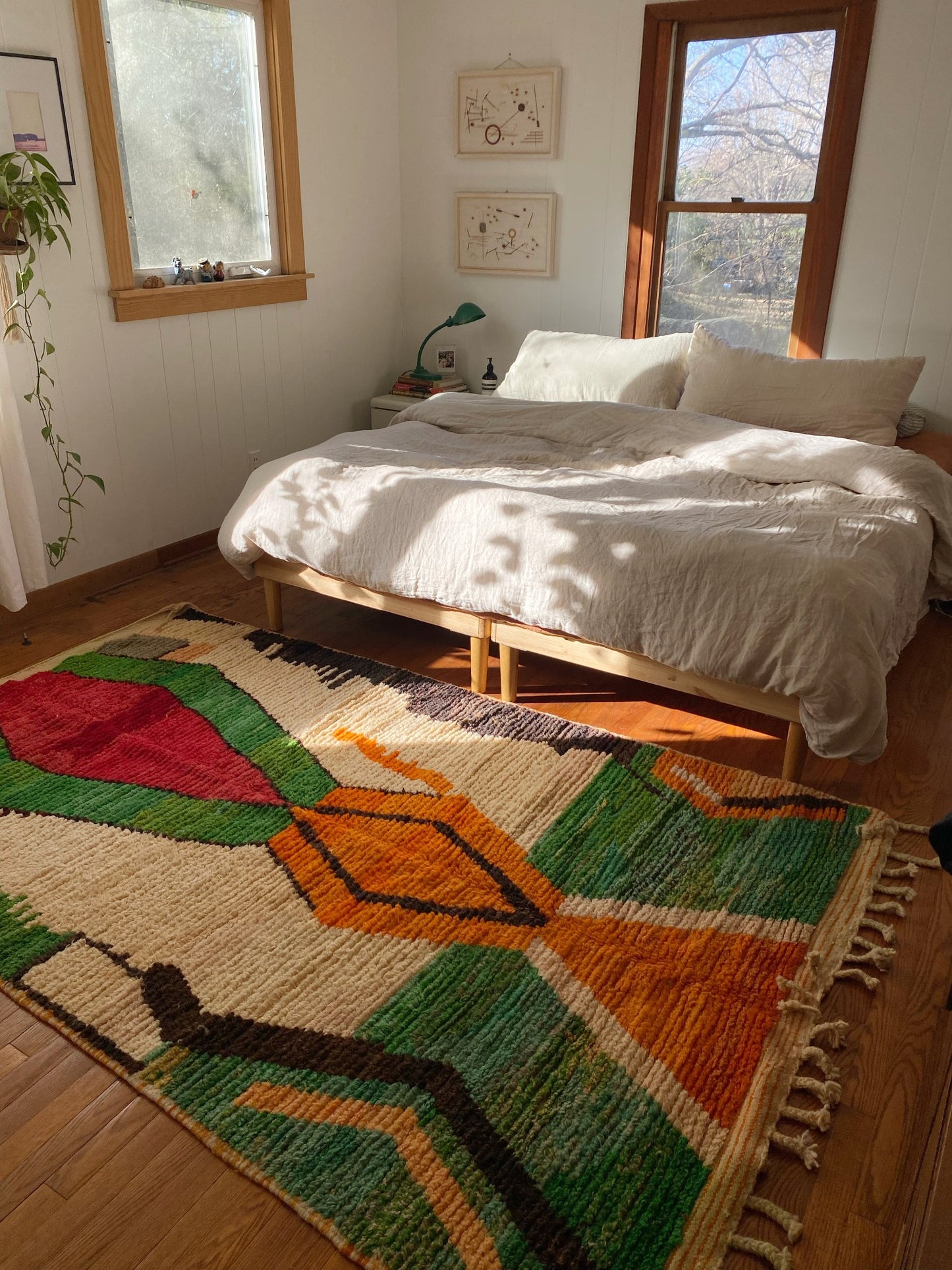 See Sikora Moroccan Rug with a King Size Bed