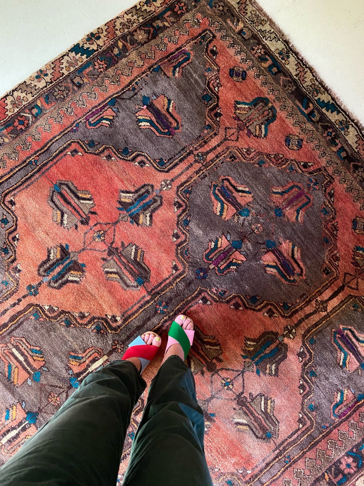 Bright indigo really shines from an overhead shot on Copper Persian Rug