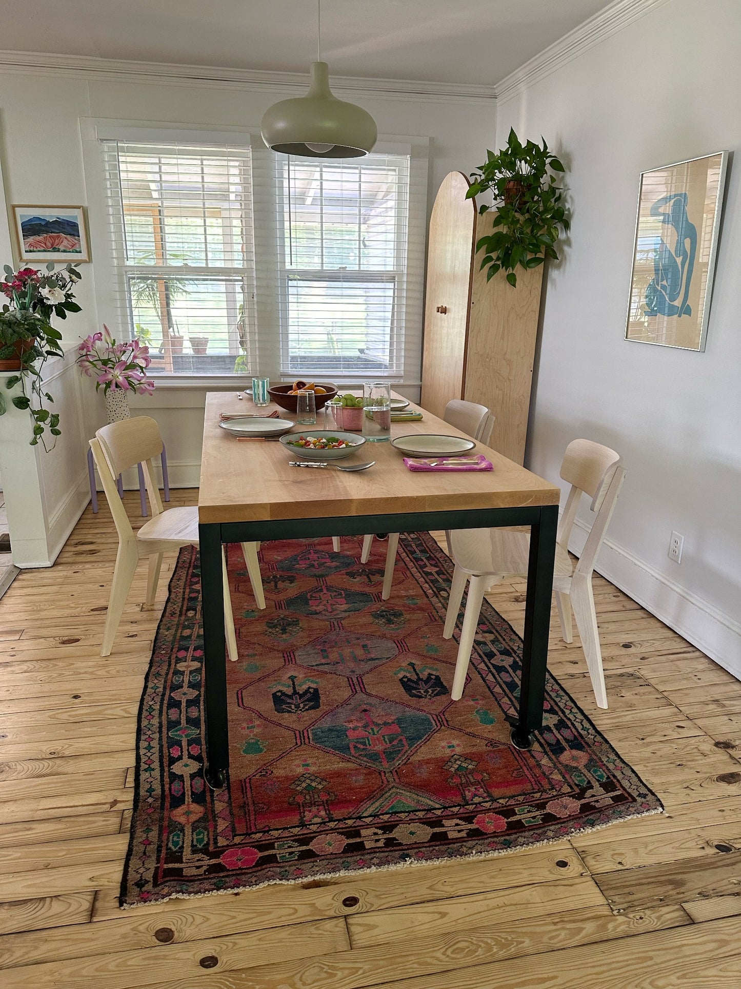 See Multicolor Vintage Persian Rug in a Dining Room