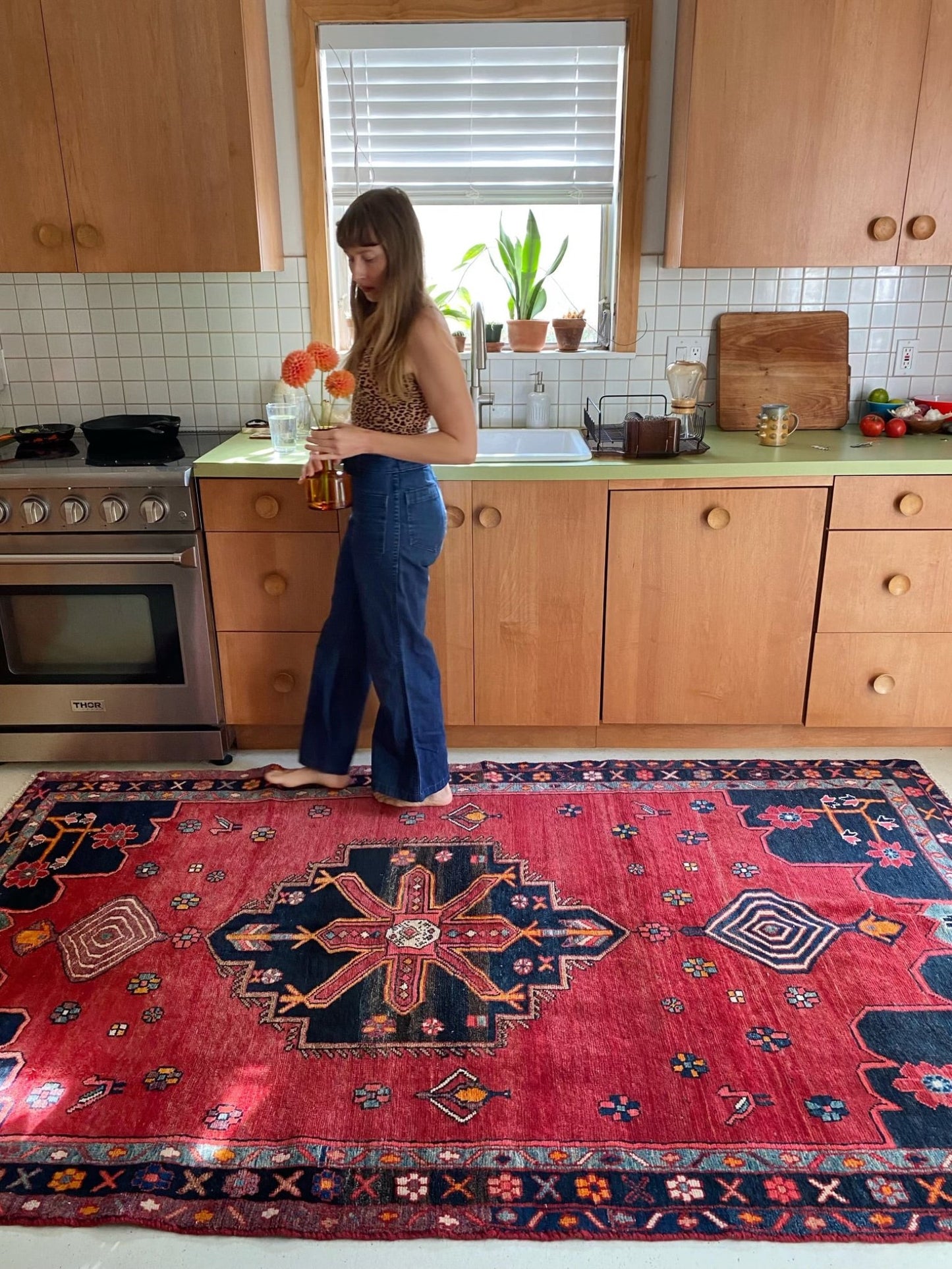 See Haas Vintage Red Persian Rug in a Kitchen