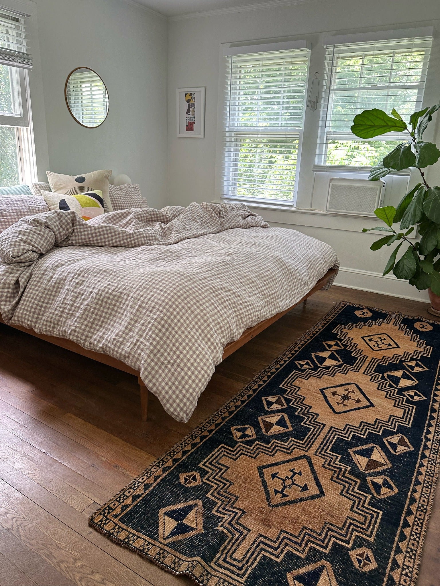 See Stone Runner Rug Styled at the Foot of the Bed