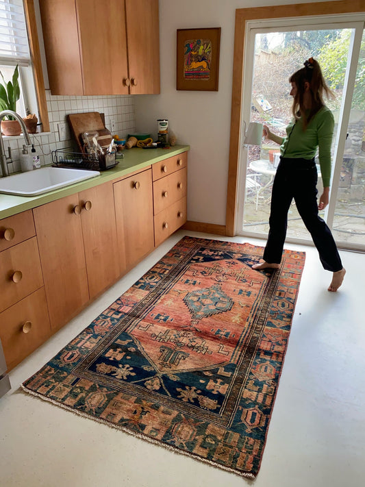 Enhance a Kitchen space with a Vintage Terracotta Persian Rug