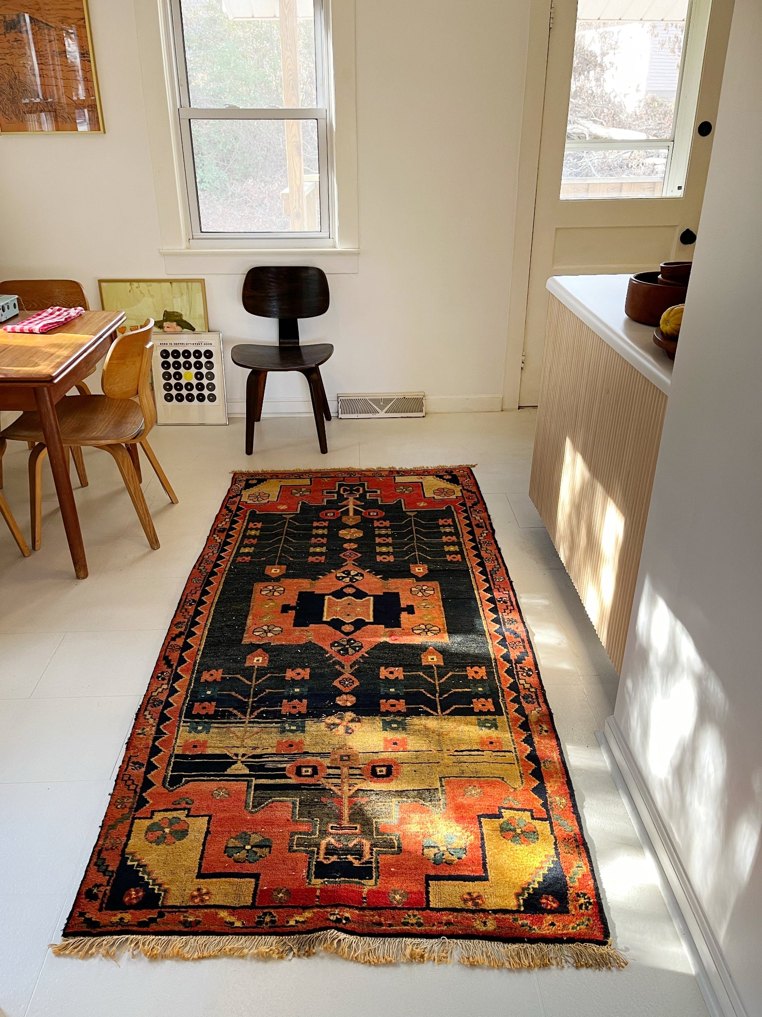 Style a Vintage Persian Rug in a Dining Room