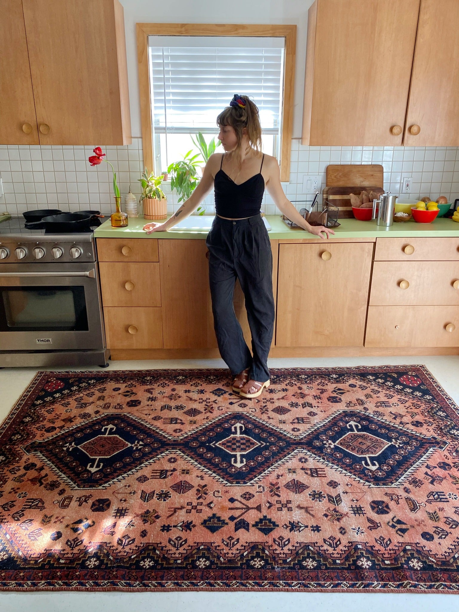 See Katzen Terracotta Vintage Persian Rug in a Kitchen