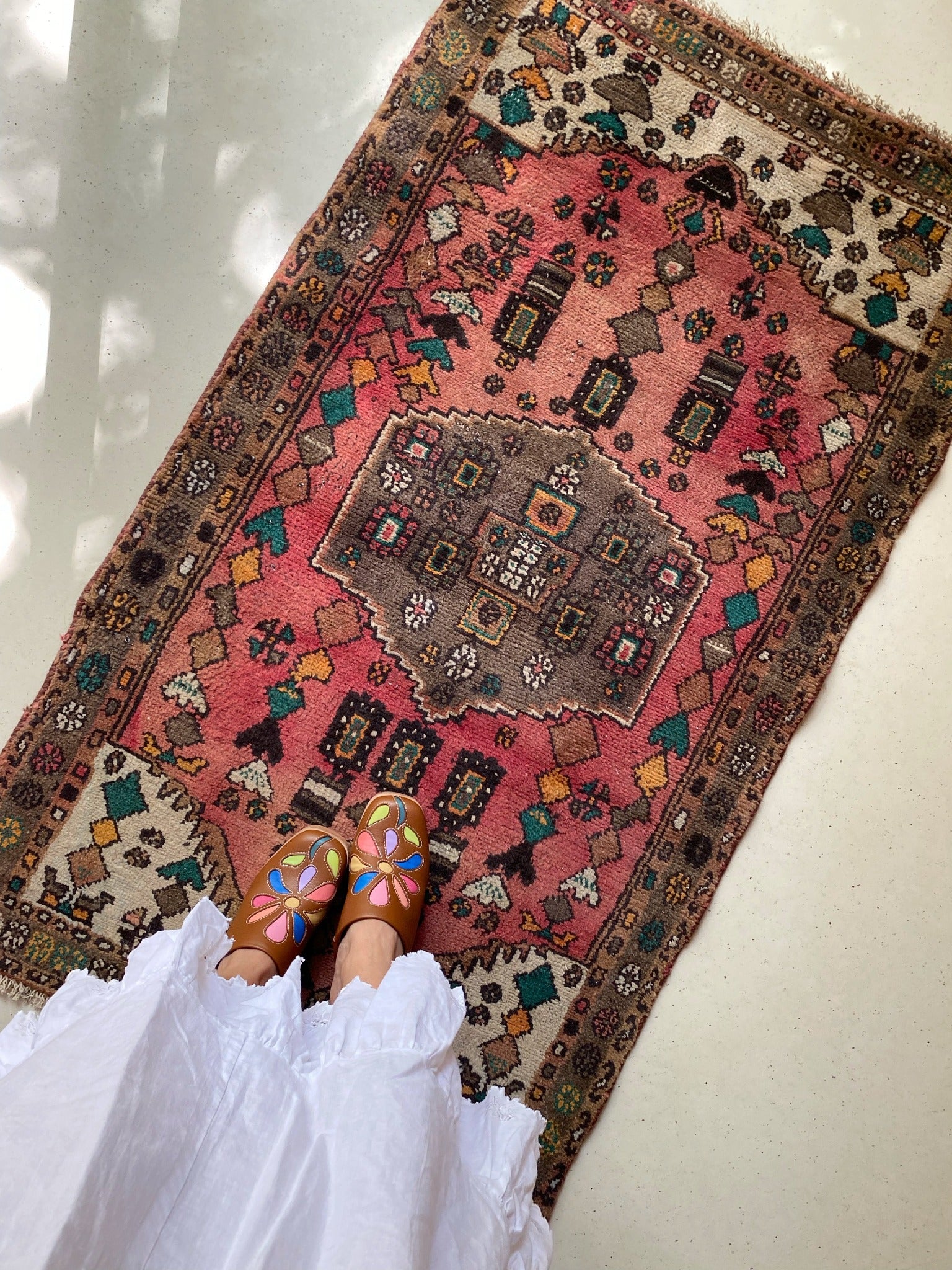 See Mahogany Persian Rug from Overhead