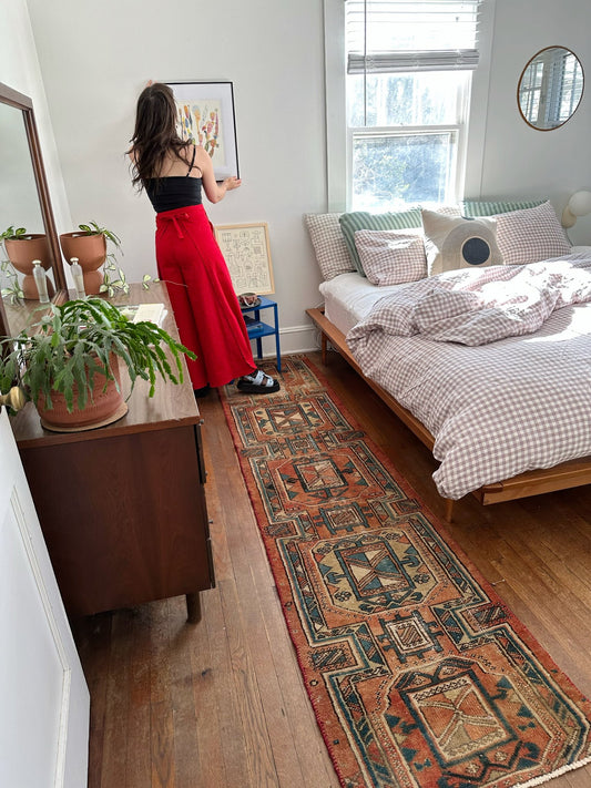 Enhance a Bedside with a Vintage Runner Rug