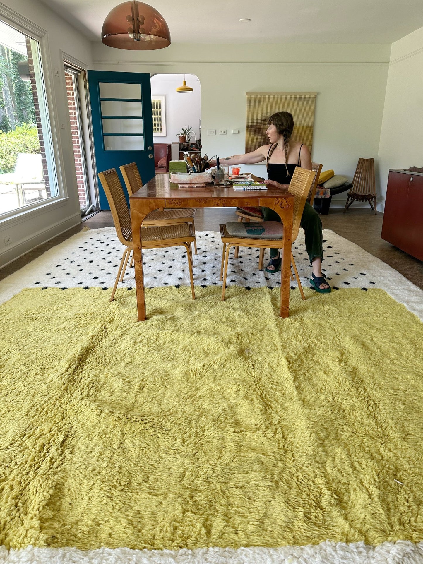 See a Dining Room Styled with Large Moroccan Area Rug