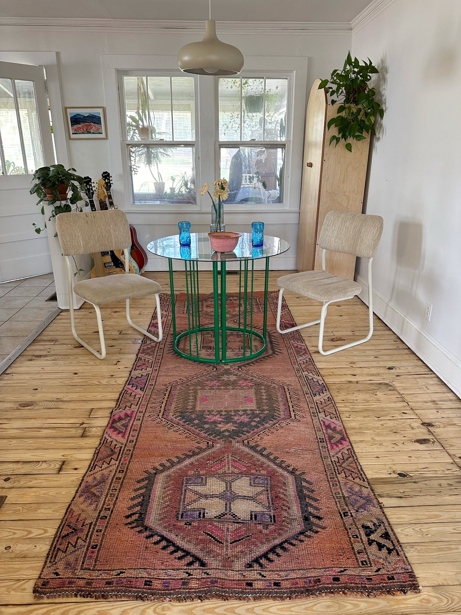 See Tonea Vintage Pink and Purple Rug in a Dining Room