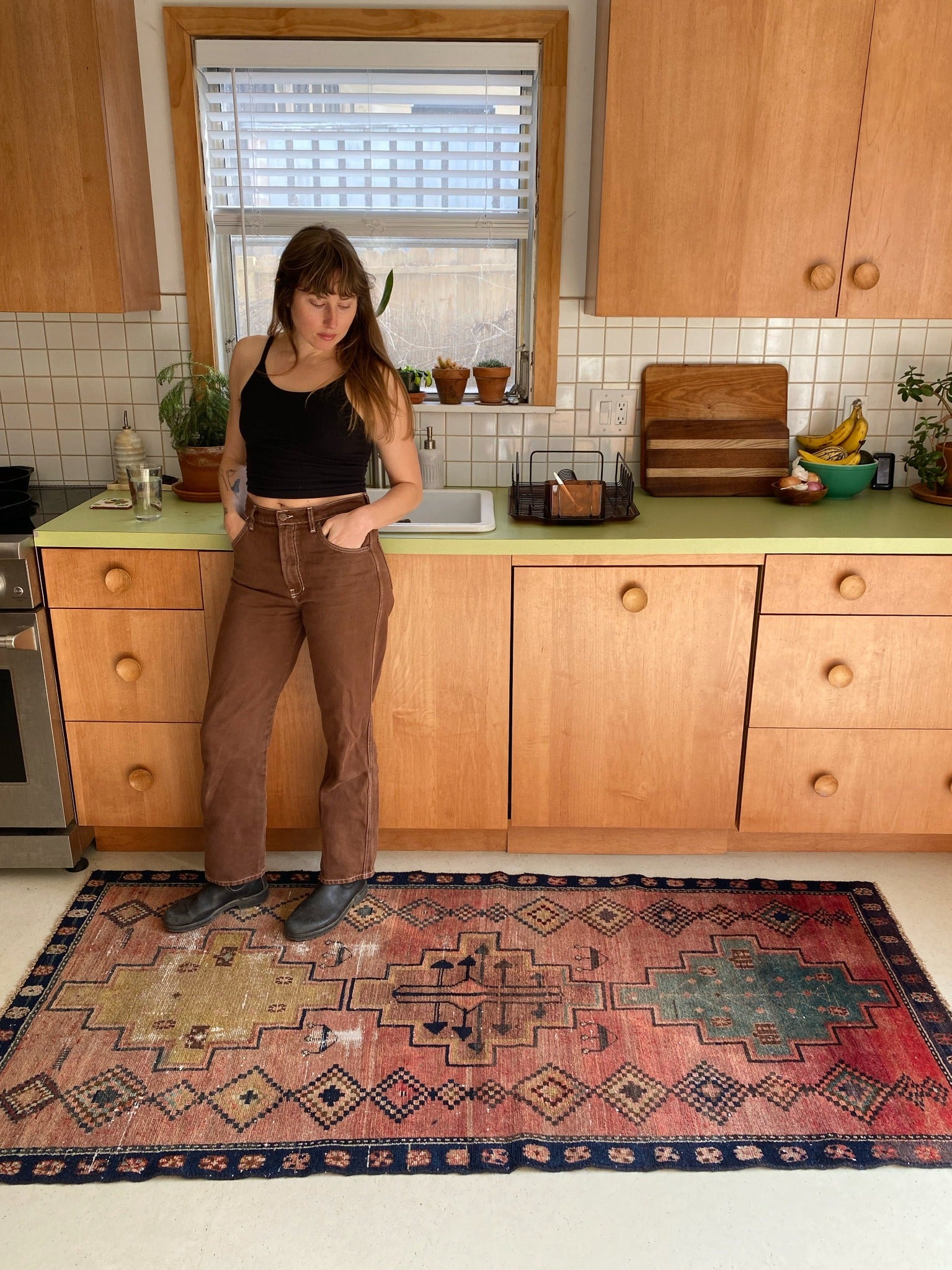 See Santo Pink Vintage Persian Rug in a Kitchen