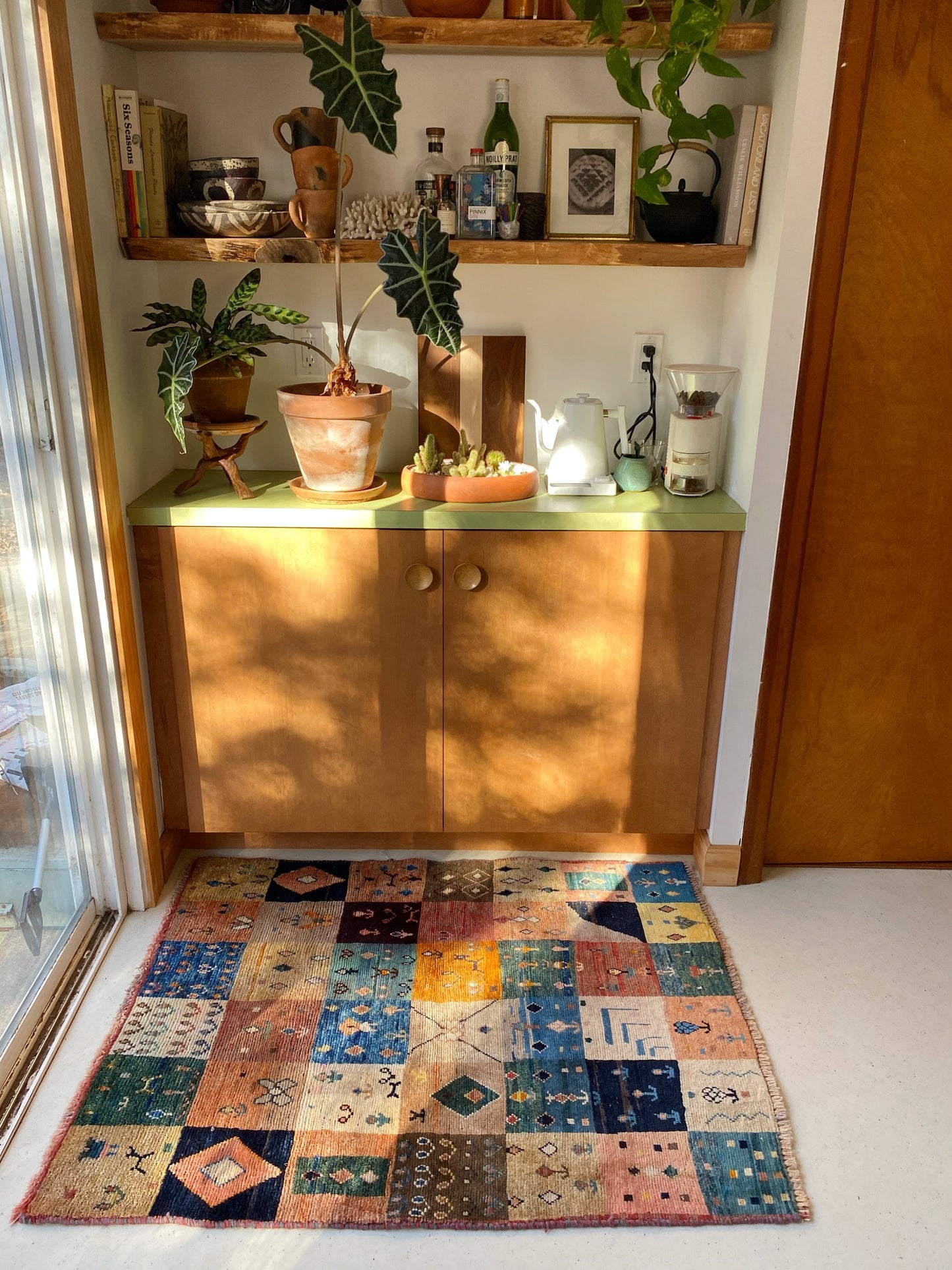 Enhance a Coffee Bar with Mosaic Patterned Vintage Persian Rug