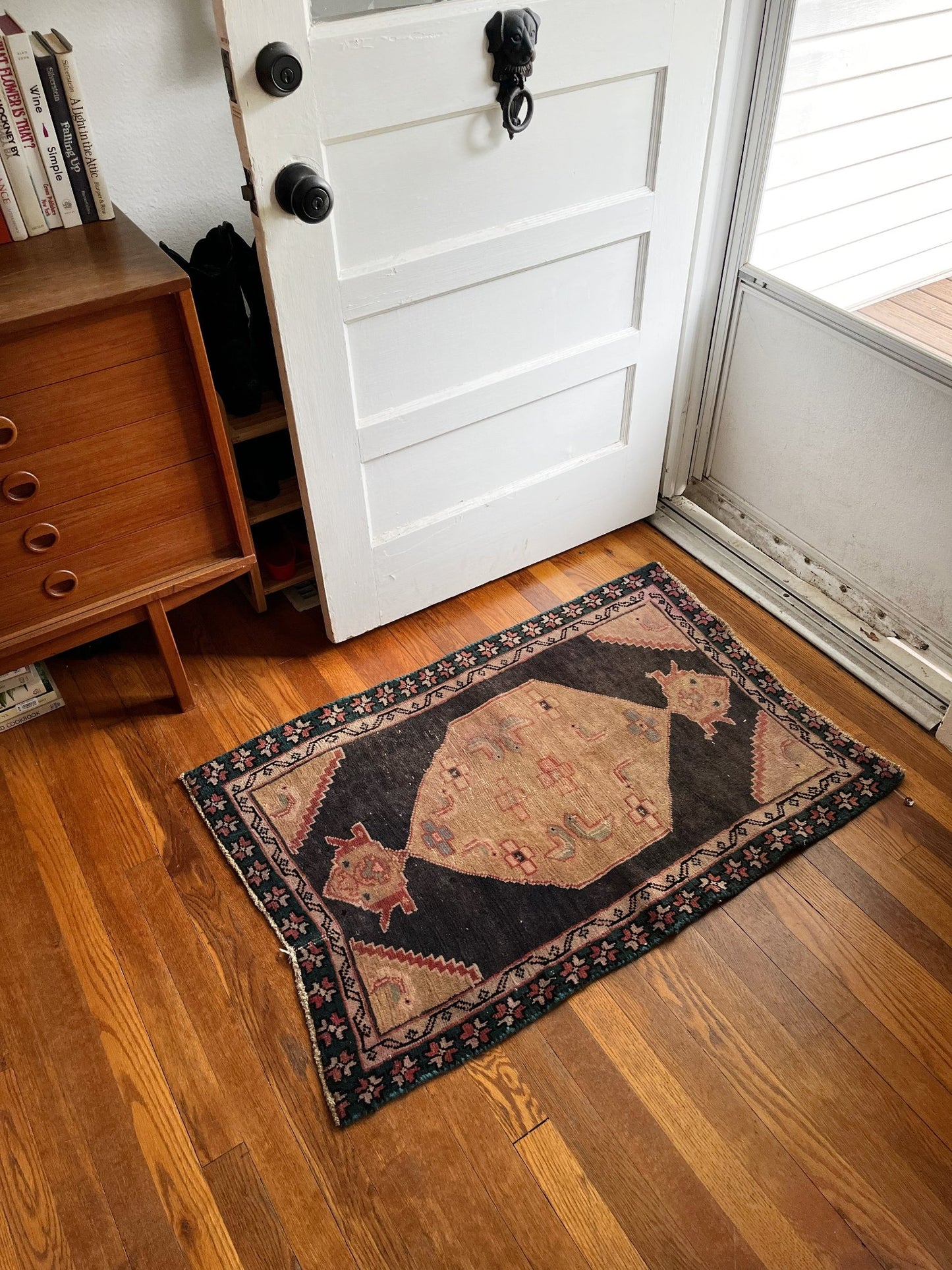 Enhance an Entryway with a Mini Vintage Persian Rug