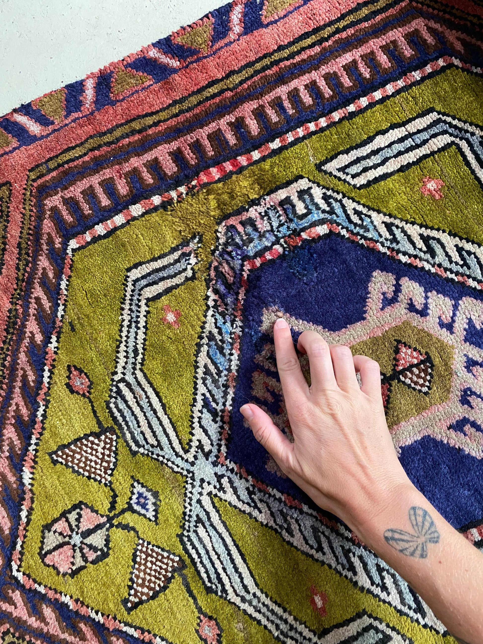 Some minor wear shown in Pear Persian Rug
