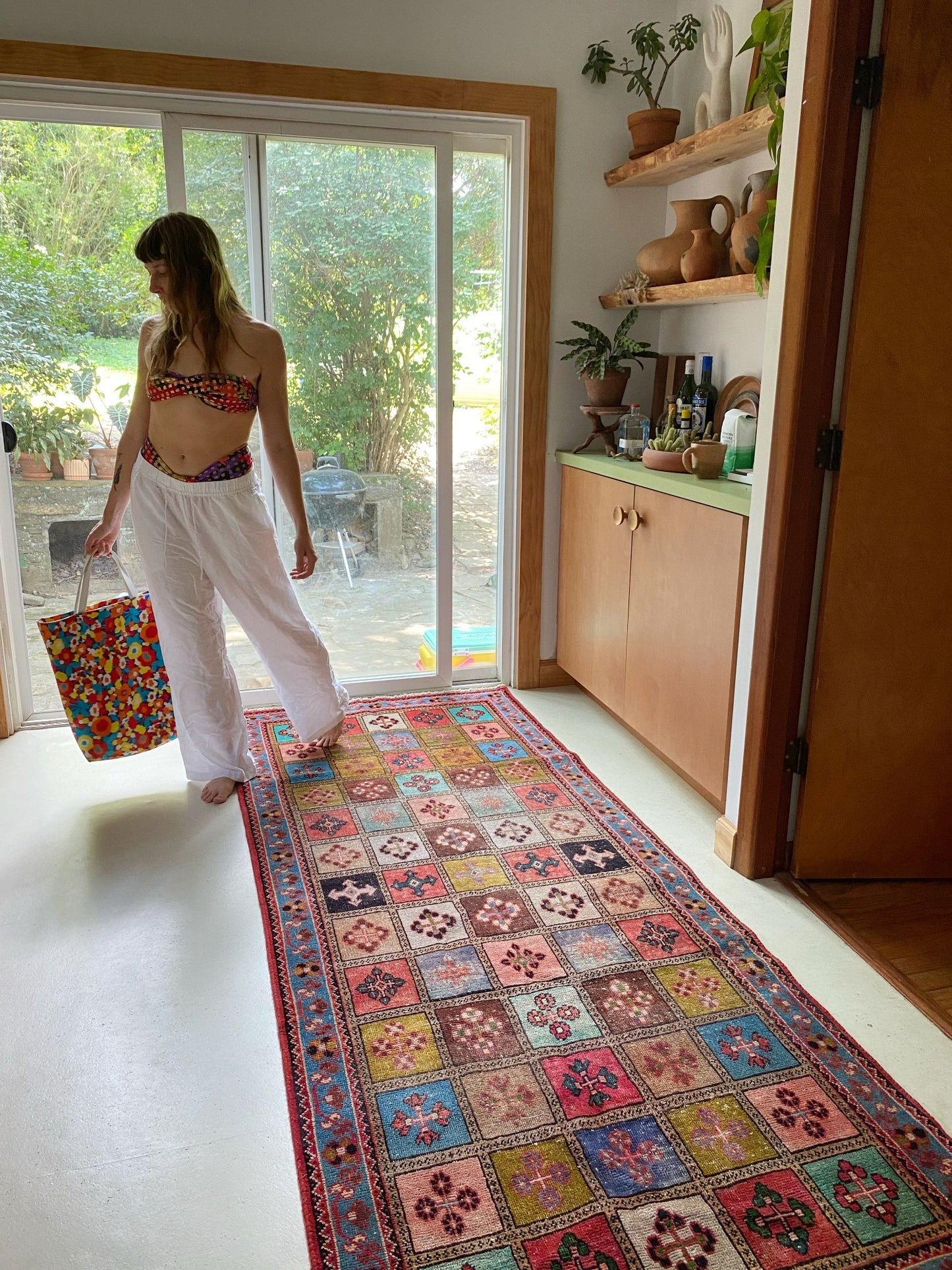 See Mosaic Patterned Rug in a Kitchen