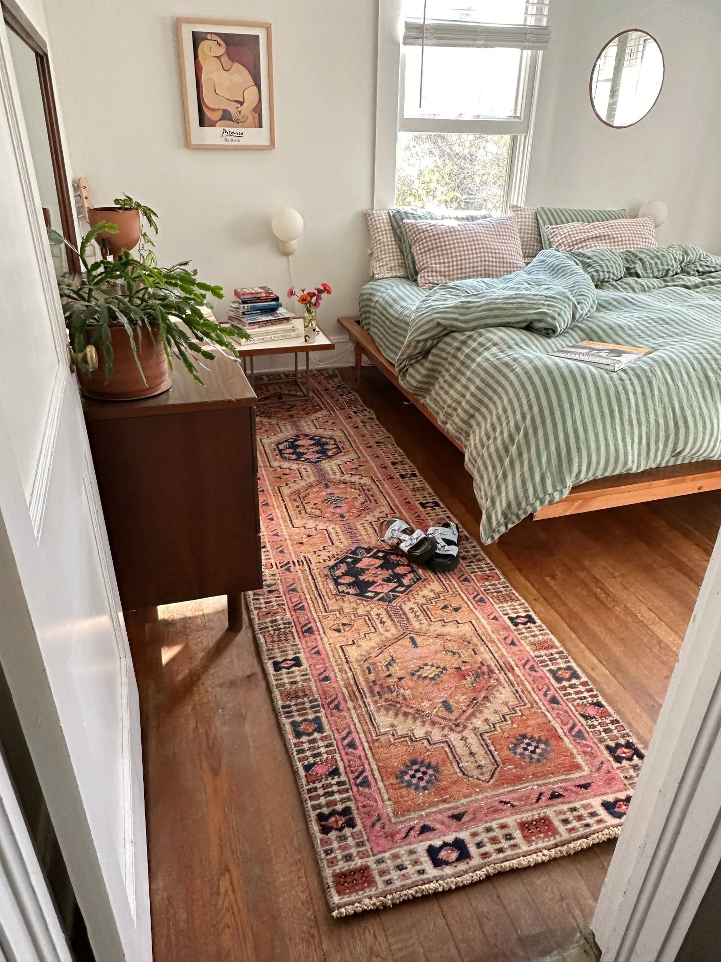 Style a Modern Bedroom with a Vintage Pink Persian Runner Rug