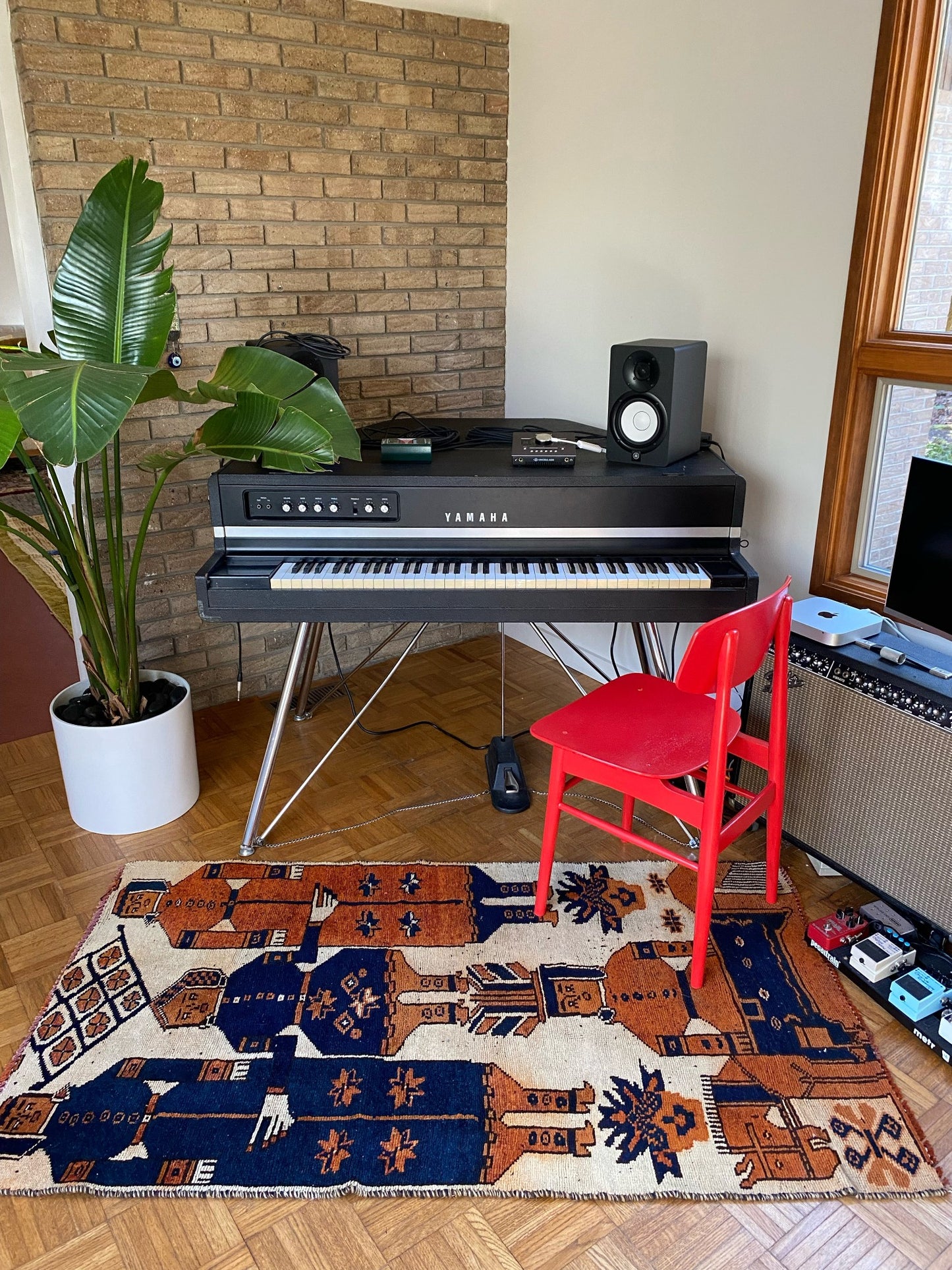 Irregular shaped rug styled with a Keyboard