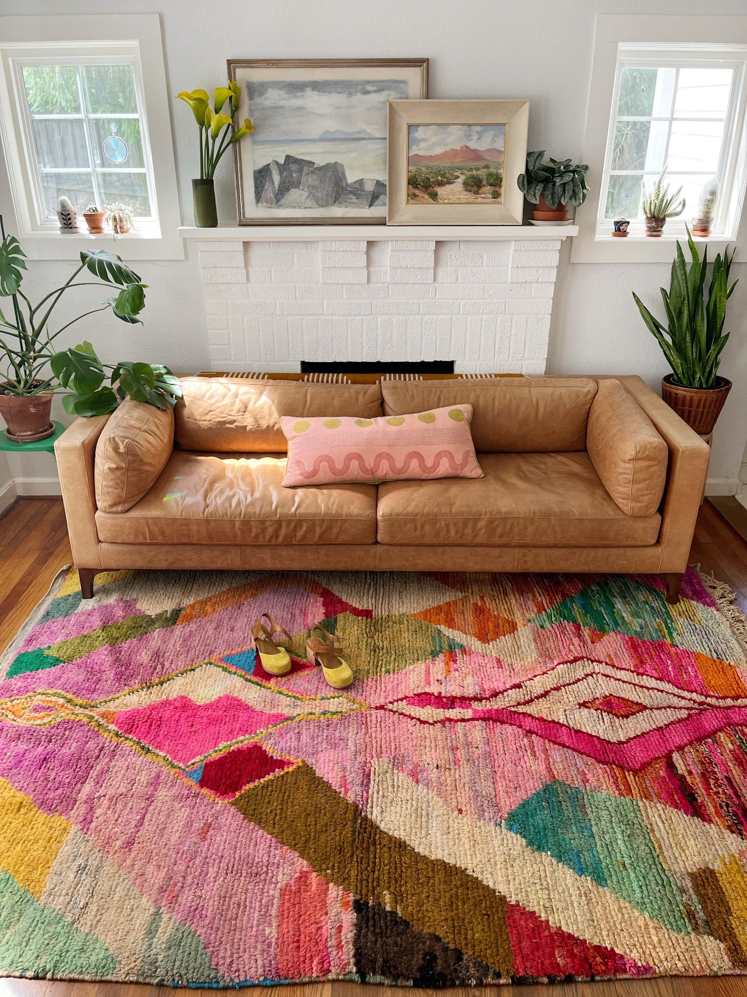 See a Living Room with a Bright Handmade Area Rug